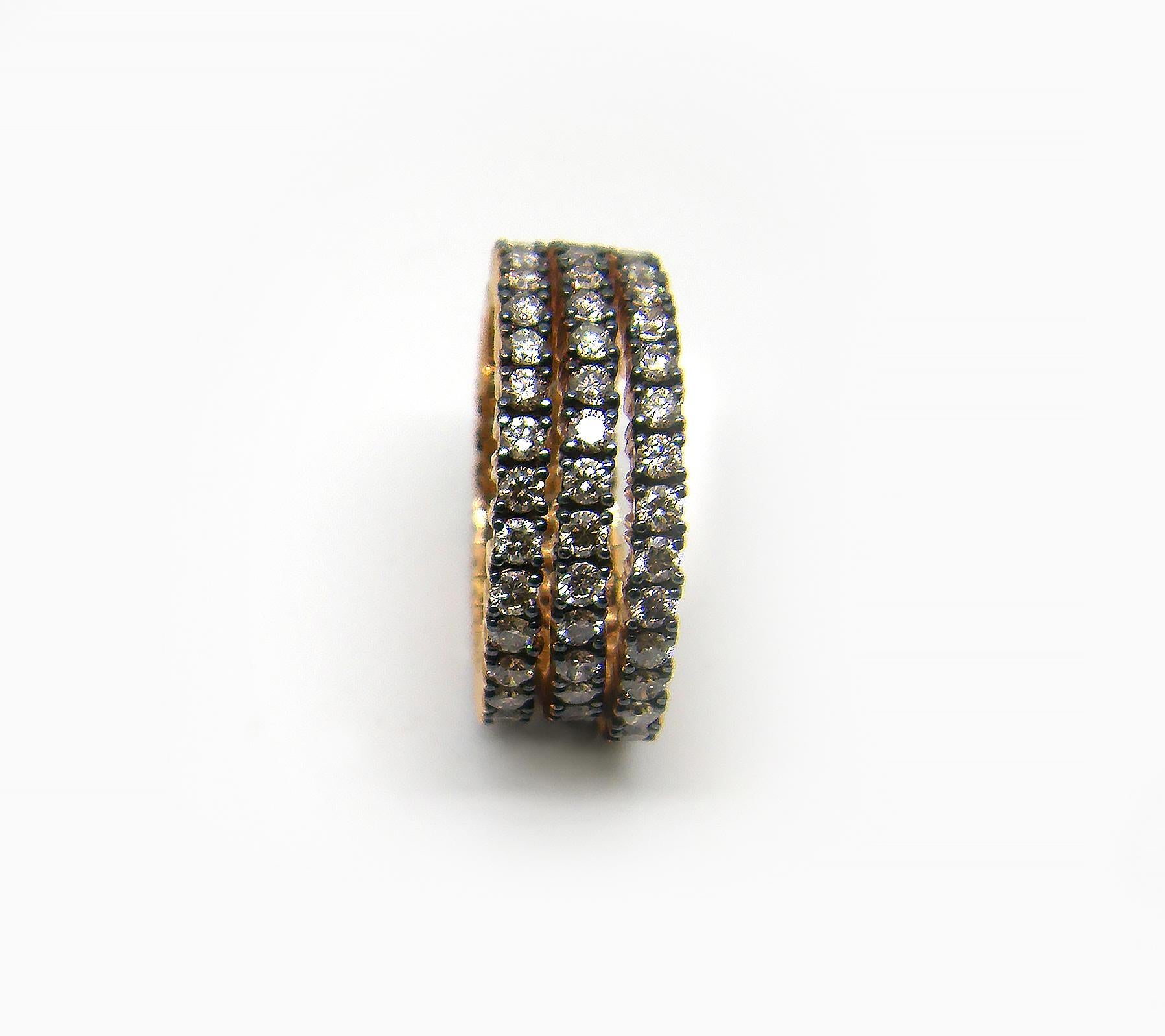 S.Georgios designer 18 Karat Yellow Gold Brilliant Cut Brown Diamond Black Rhodium wide band Ring is all handmade in a unique three-row design. The gorgeous ring features brilliant-cut brown diamonds total weight of 2.48 Carat and is set