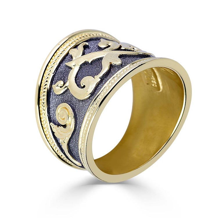 S.Georgios designer ring is all handmade from solid 18 Karat Yellow Gold and custom-made. The stunning ring is microscopically decorated with gold motives and granulated details contrast with a unique Byzantine velvet background finished in Black