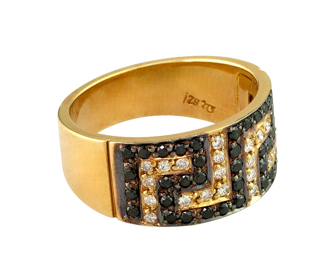 S.Georgios designer 18 Karat Yellow Gold Ring featuring the Greek Key design symbolizing eternity. It has 63 Brilliant Cut White and Black Diamonds total weight of 0.69. The quality of the stones and workmanship is outstanding and is all handmade in