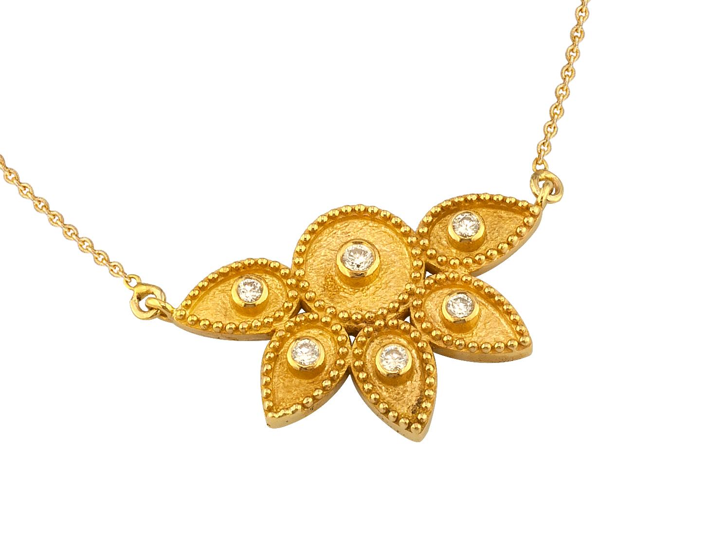S.Georgios designer chain pendant necklace is 18 Karat yellow gold and microscopically decorated with hand-made bead granulation workmanship, and finished with a unique velvet background look. This beautiful floral pendant features 6 brilliant-cut