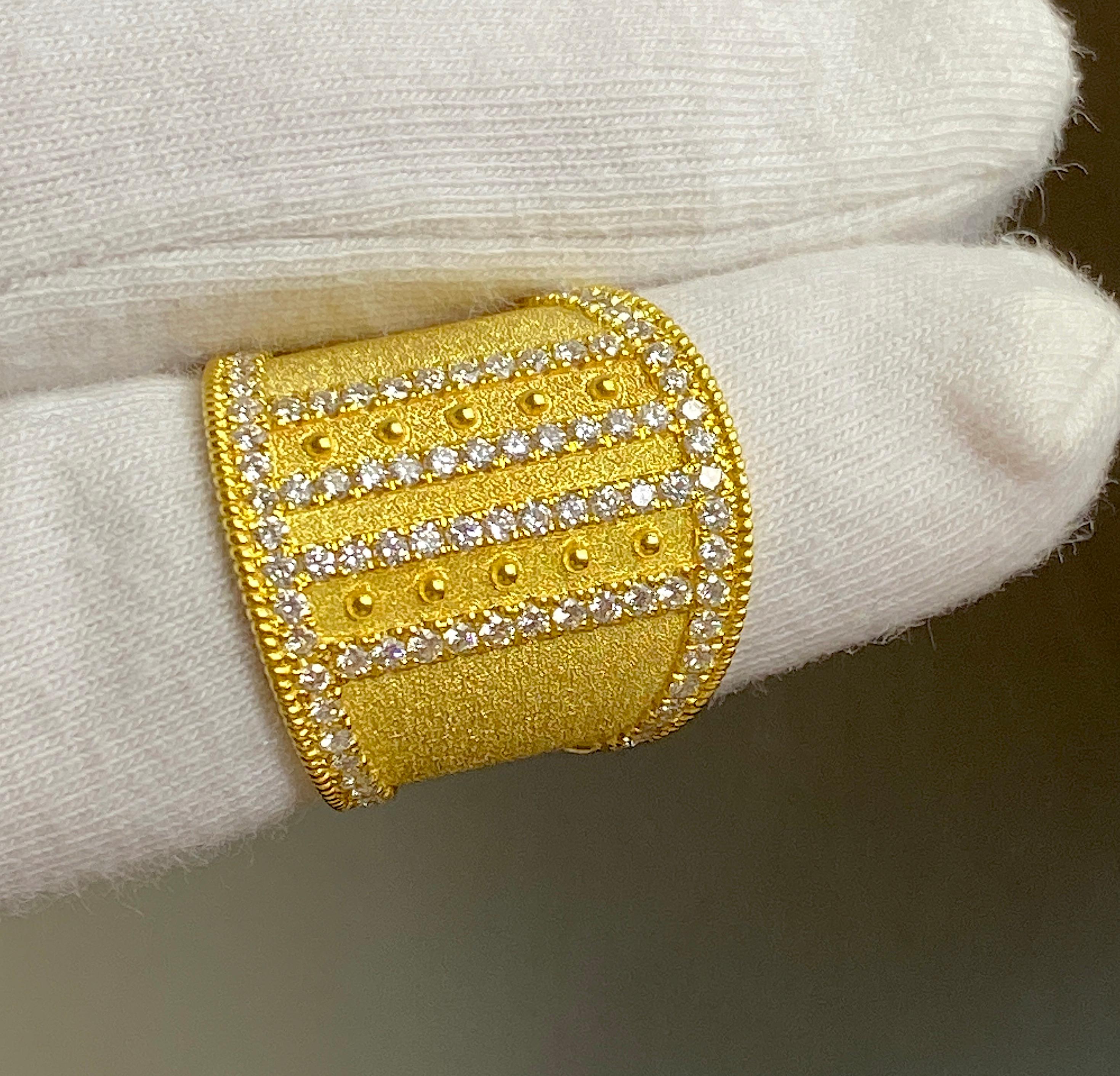 You are admiring S.Georgios designer 18 Karat Solid Yellow Gold Wide Ring all handmade in Byzantine style and a stunning unique velvet background. This gorgeous ring features  1.08 Carats of Brilliant-cut White Diamonds around the edges and in