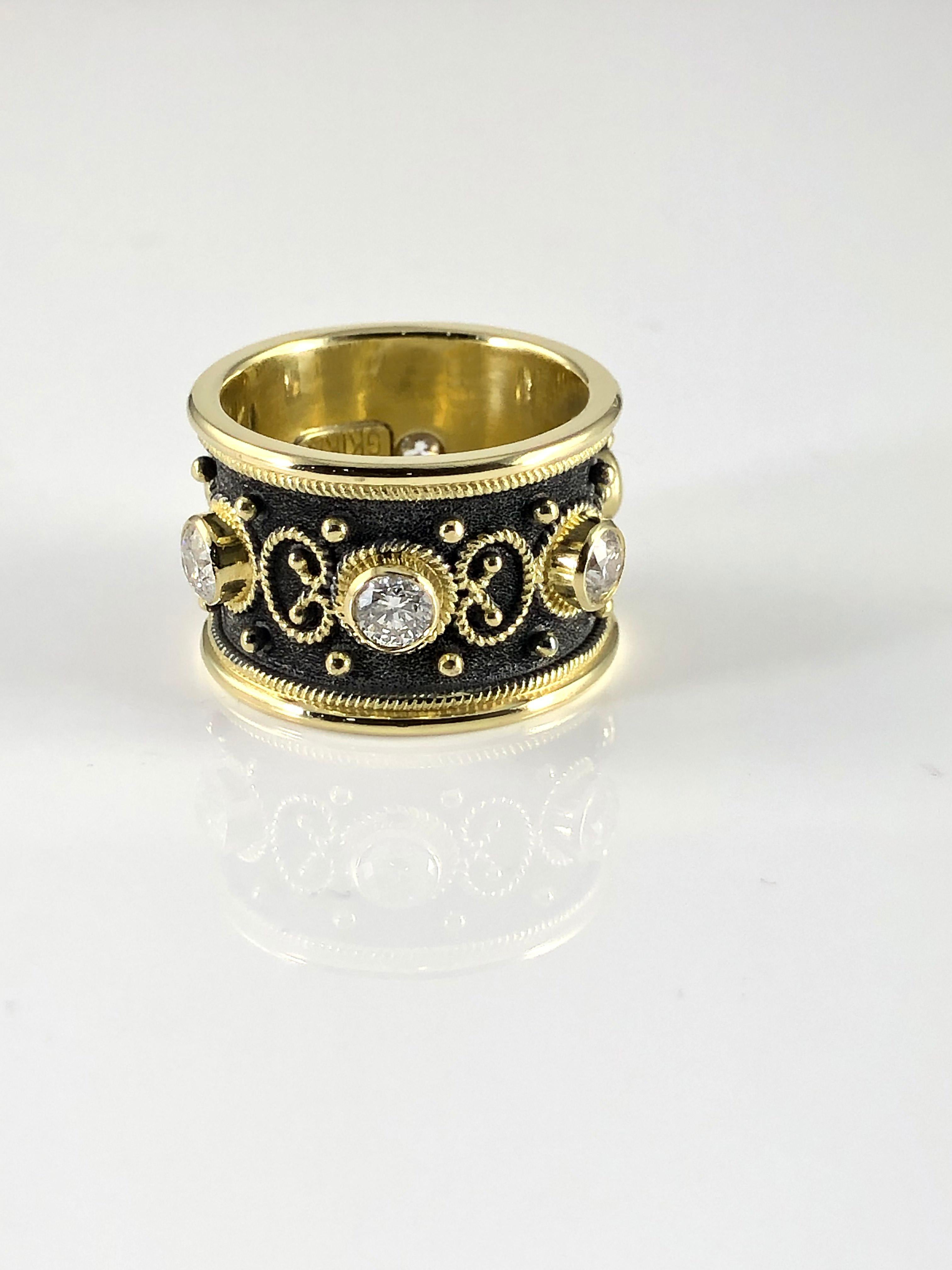 S.Georgios designer Eternity custom-made Band Ring all handmade from solid 18 Karat Yellow Gold. The stunning ring is microscopically decorated all the way around with yellow gold beads and wires shaped like the last letter of the Greek Alphabet -