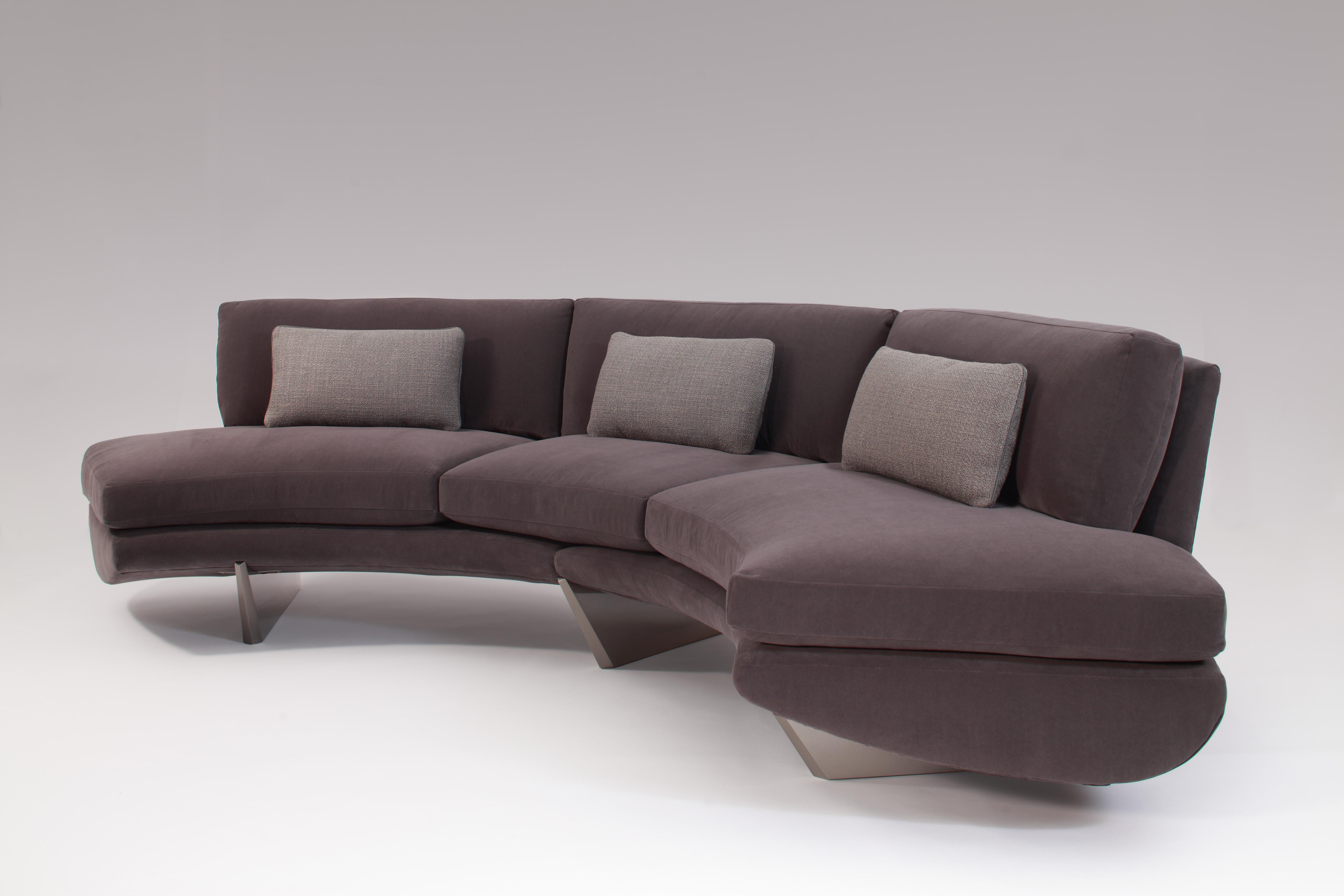 A sweeping revision of the conventional sectional, this fabulous piece by Georgis & Mirgorodsky curls gracefully into a semicircle, and rests on a series of well-spaced legs. While only loosely inspired by its namesake—the sofa's legs resemble the
