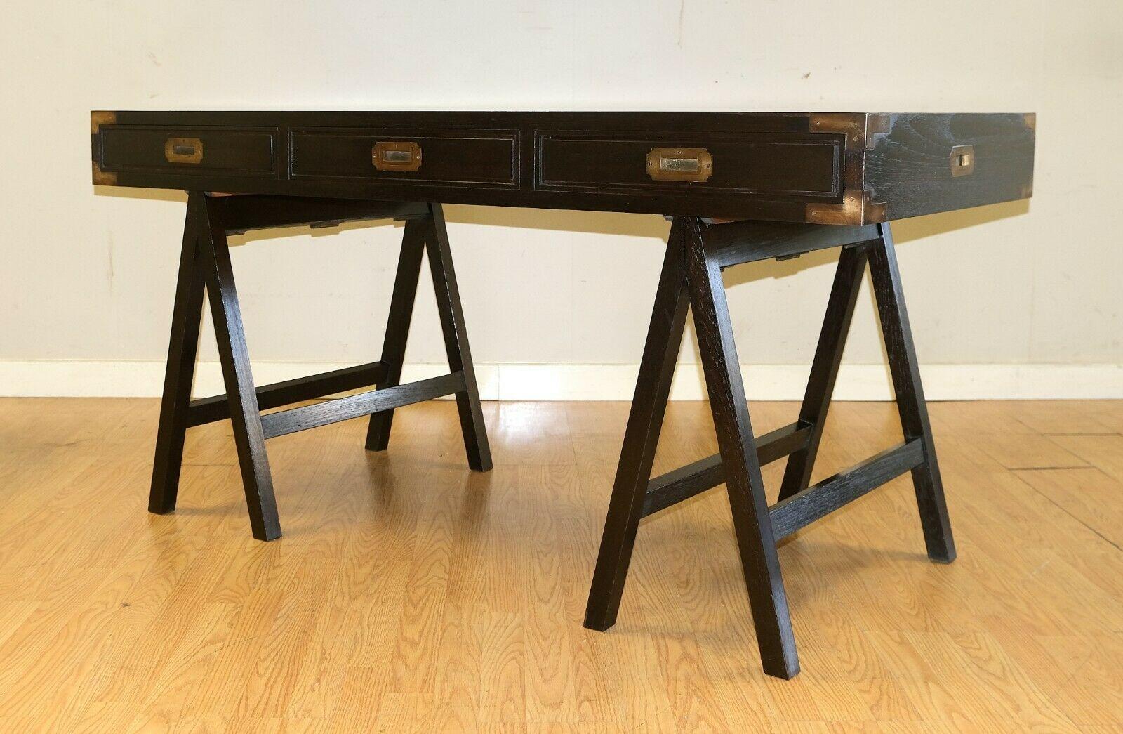 brown wood desk with drawers