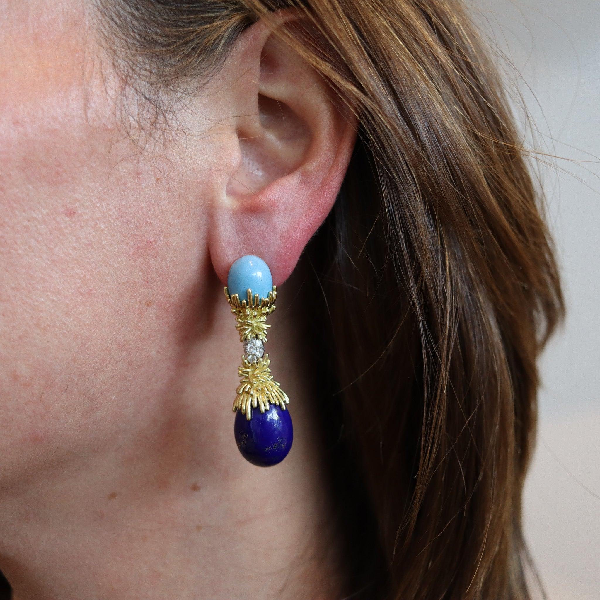 Dangle drops earrings designed by Georland Paris.

This fabulous dangle drops earrings, were created in Paris France at the jewelry atelier of Georland Paris, back in the 1970. These earrings have been crafted with modernist textured patterns in