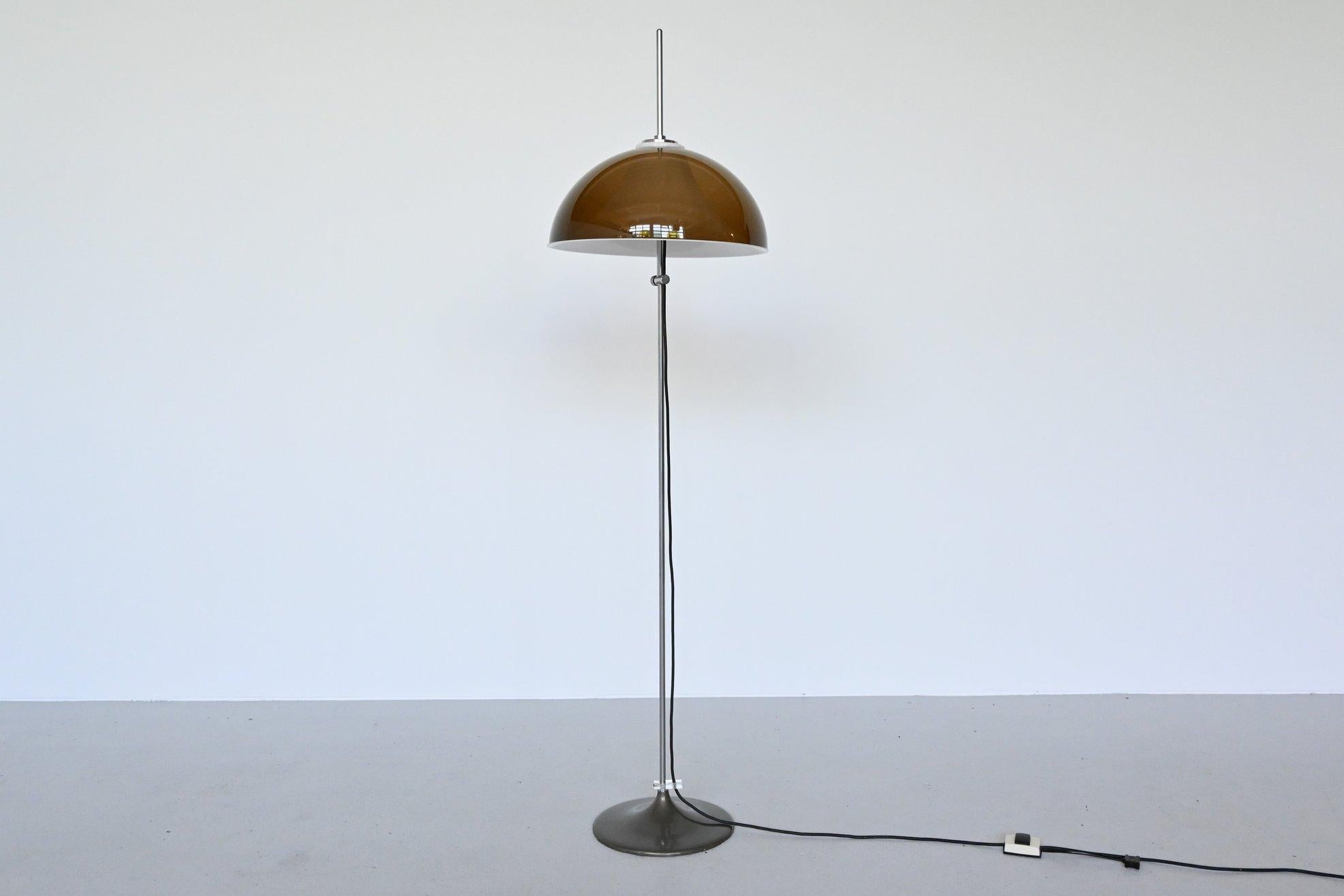 Very nice atmospheric floor lamp designed in the style of Gino Sarfatti Italy and manufactured by Gepo N.V., the Netherlands, 1960. It has an orange brown translucent acrylic mushroom style lampshade resting on a white opal acrylic diffuser. The