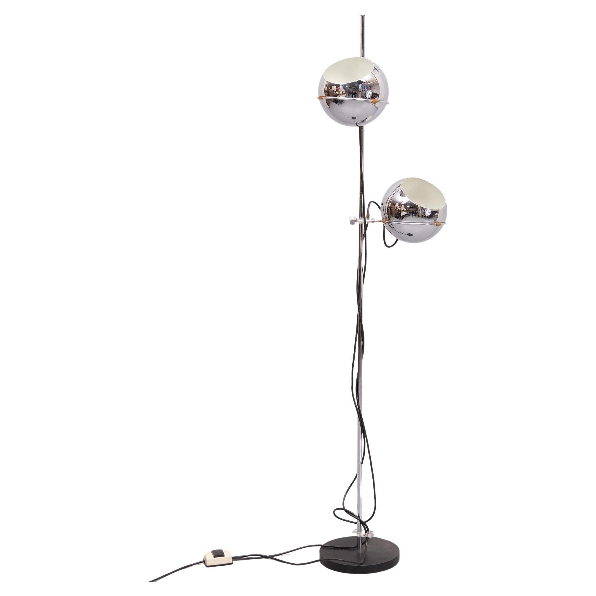 Gepo Floor Lamp Chrome; sixties floor lamp designed by the brothers Postuma for the Dutch company Gepo. The ball-shaped caps are adjustable in height and can be turned up or down for direct or indirect lighting. Material: iron, chrome. This vintage