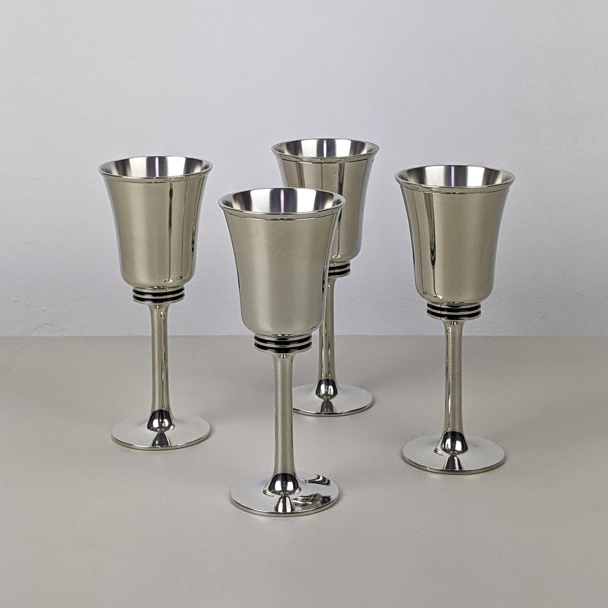 Gerald Benney for Selangor Pewter (Royal Selangor), designed c.1986
Set of 4 pewter goblets

A beautiful boxed set in excellent un-used condition. Original boxes, packaging and leaflets.

Dimensions, approx..:
Goblets, each: Height 15.5cm,