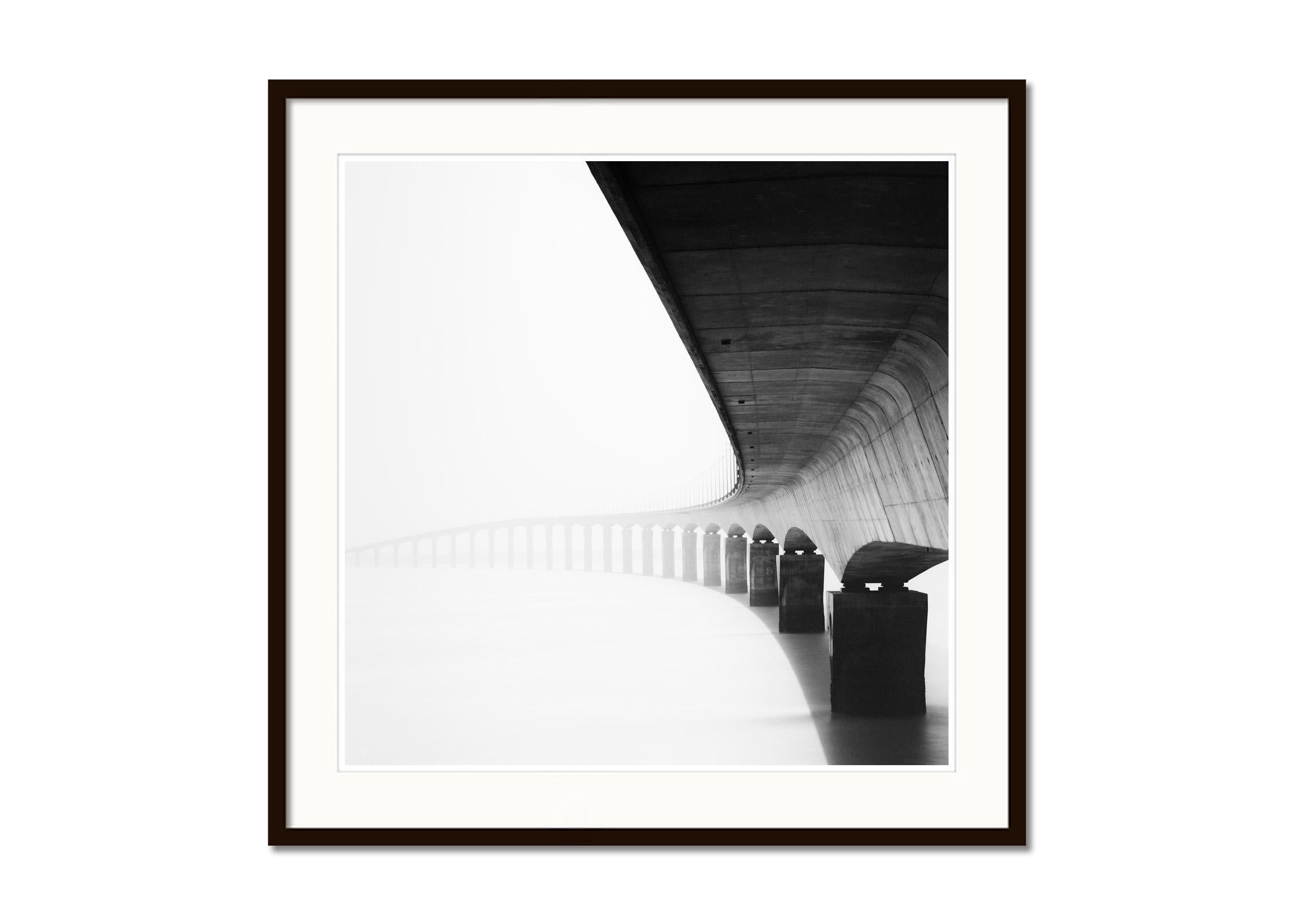 Ile de Re bridge, sunny morning, France, black and white photography, landscape - Gray Landscape Photograph by Gerald Berghammer, Ina Forstinger