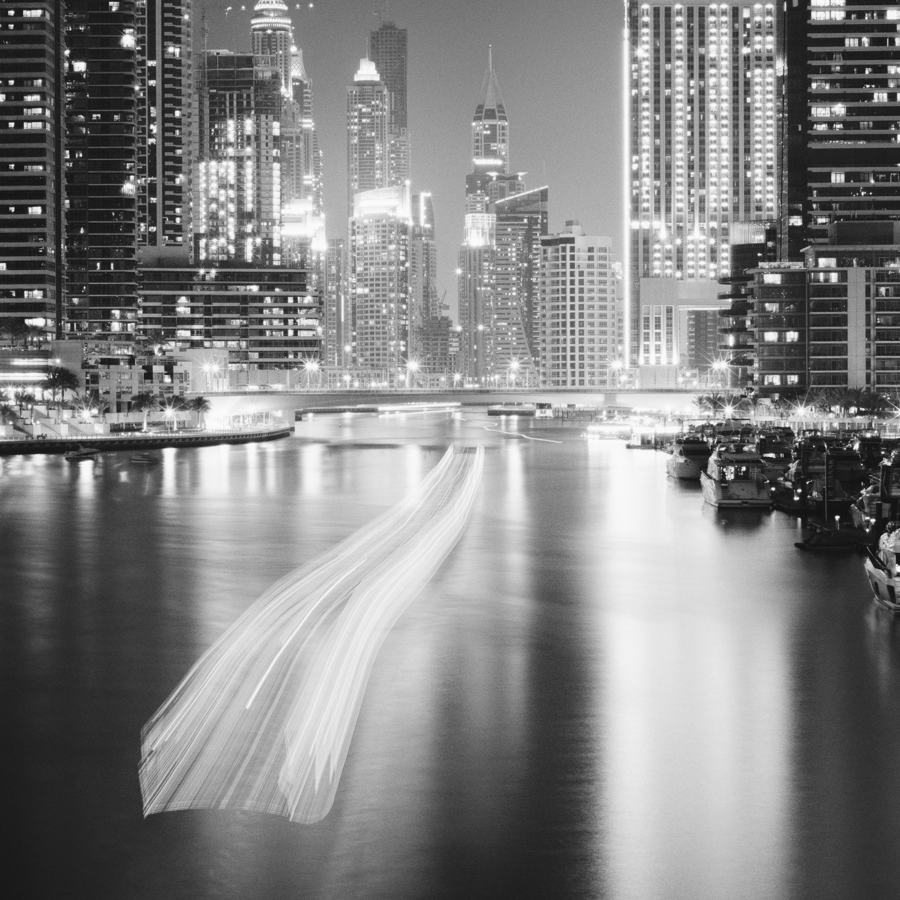Black and White Fine Art Photography - Dubai marina at night with skyscrapers, yachts and promenade, long exposure. Archival pigment ink print, edition of 20. Signed, titled, dated and numbered by artist. Certificate of authenticity included.