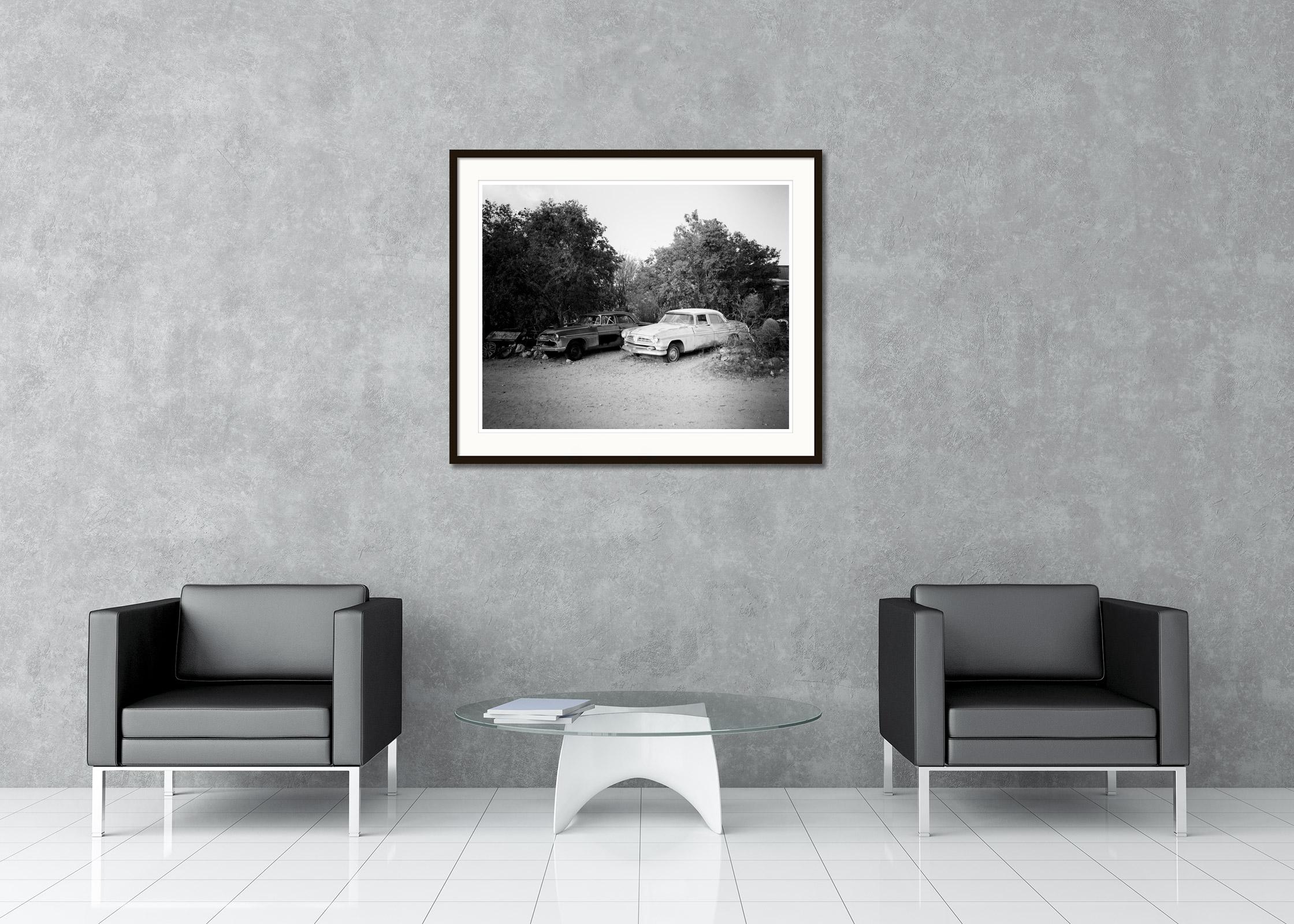 Black and white fine art landscape photography. Classic US car in a junkyard in California, USA. Archival pigment ink print, edition of 9. Signed, titled, dated and numbered by artist. Certificate of authenticity included. Printed with 4cm white