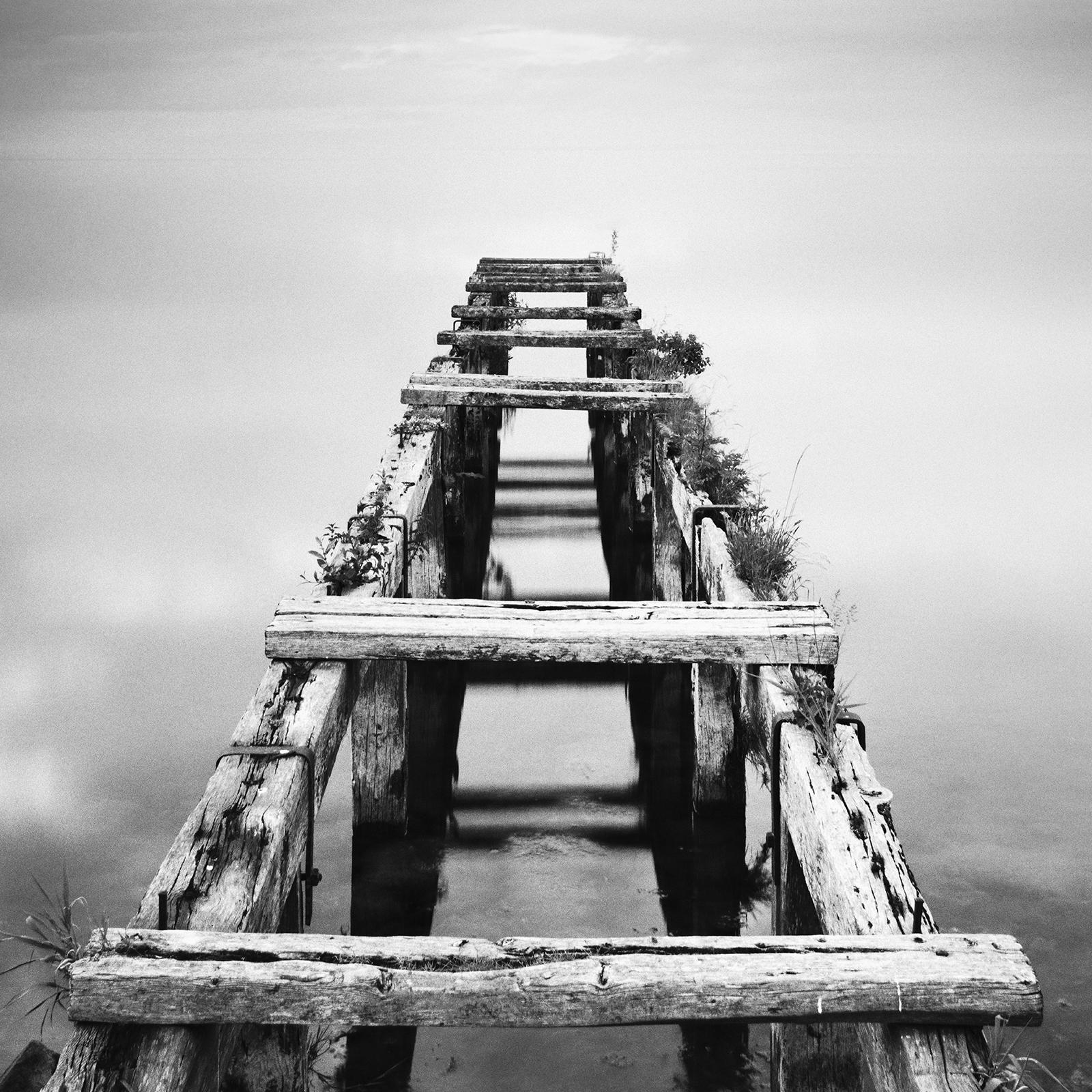 Black and white fine art long exposure waterscape - seascape photography. Abandoned wooden pier at night, Ireland. Archival pigment ink print, edition of 9. Signed, titled, dated and numbered by artist. Certificate of authenticity included. Printed