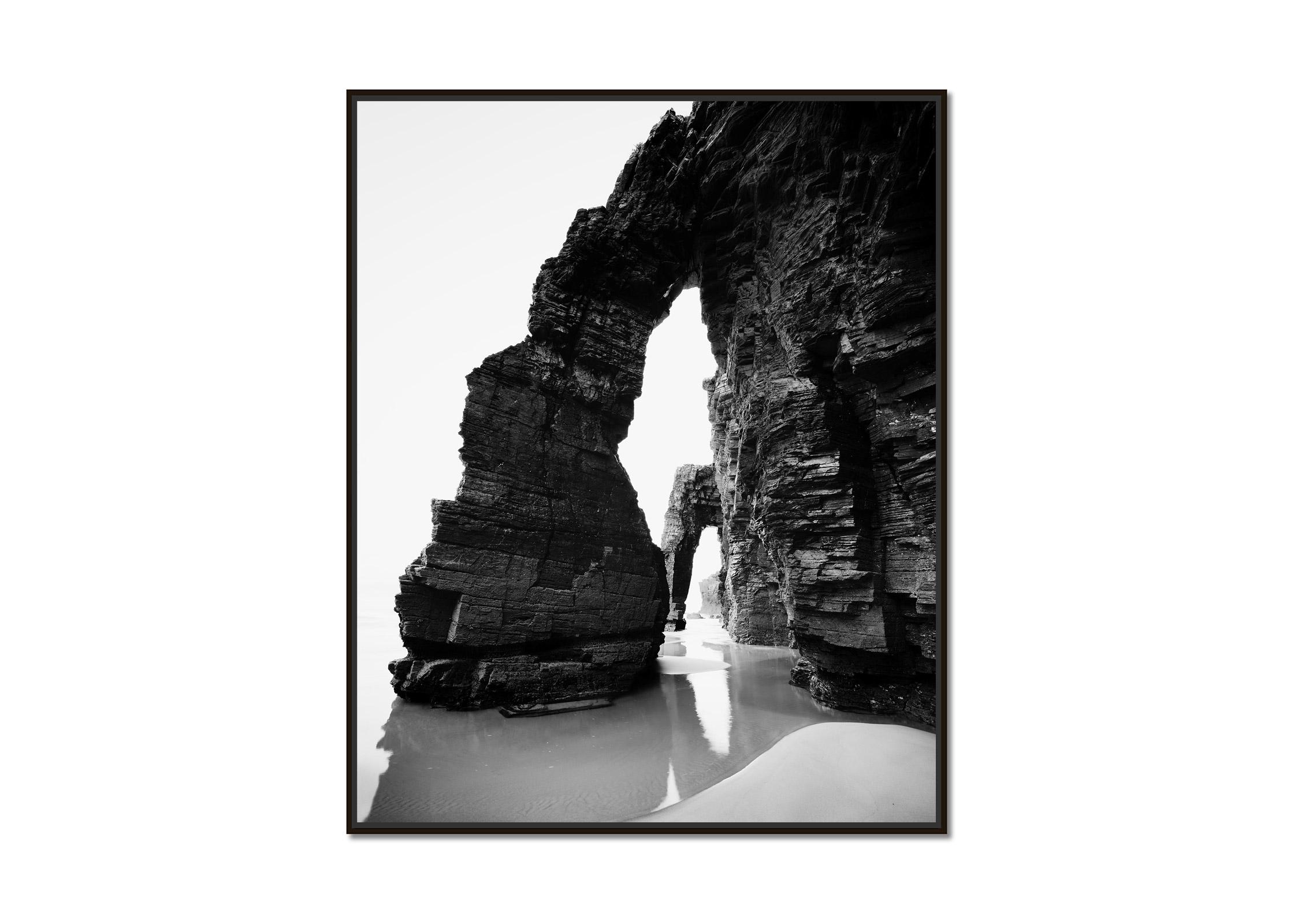 Arches, Catedrais Beach, rock formation, black and white photography, landscape - Photograph by Gerald Berghammer