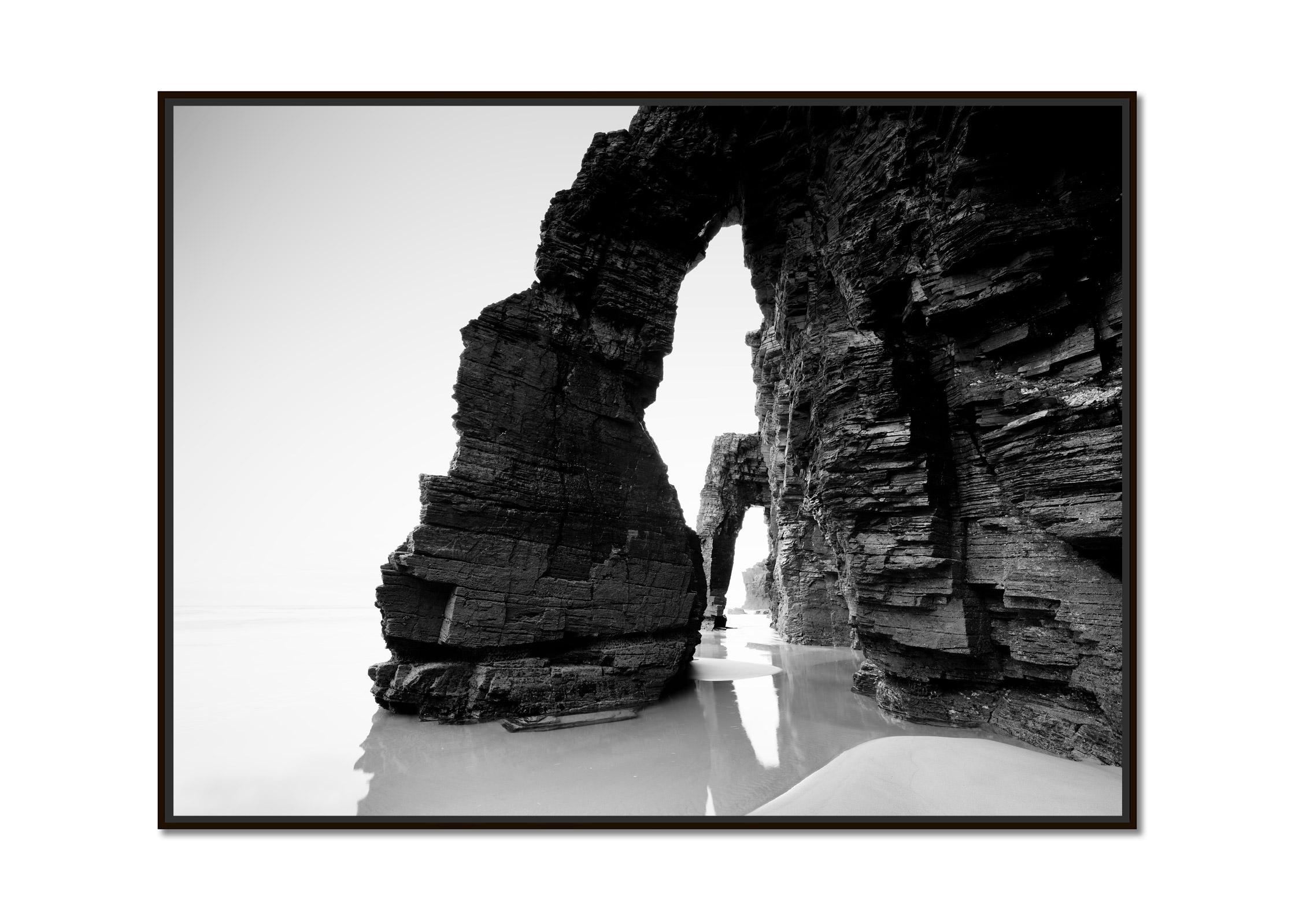 Arches on Catedrais Beach, Galicien, black and white art photography, landscape - Photograph by Gerald Berghammer