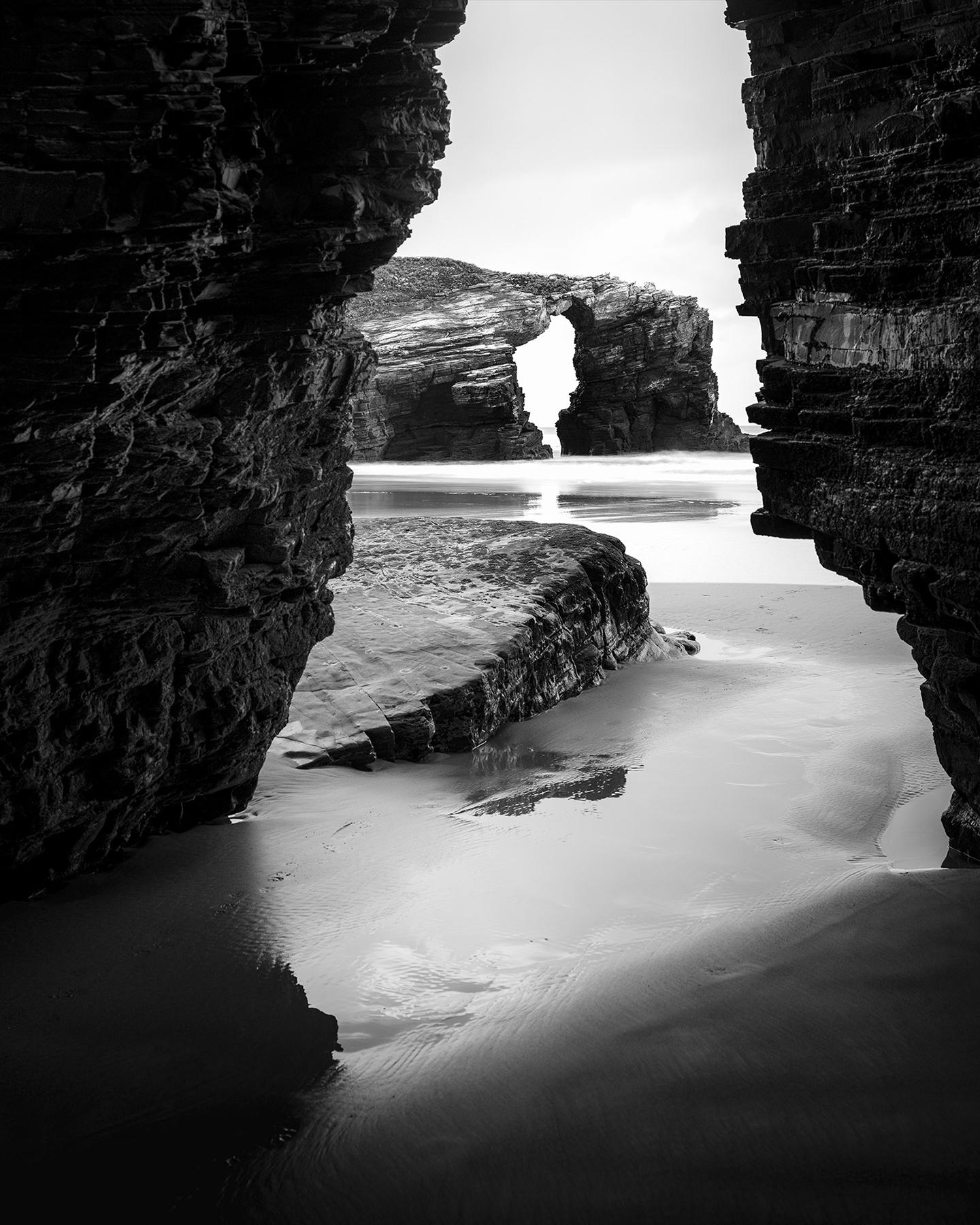 Gerald Berghammer Landscape Photograph - Arches on Catedrais, beach, rocks, Galicia, Spain, black and white landscape 