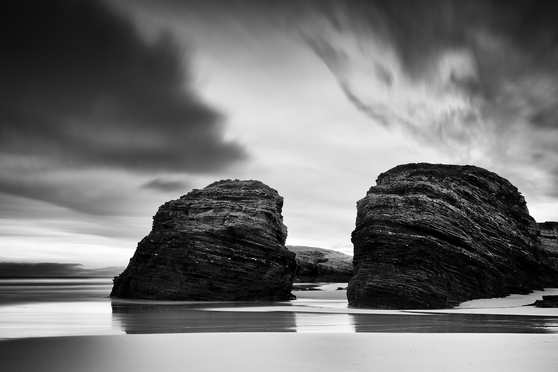 Gerald Berghammer Black and White Photograph - As Catedrais Beach, giant rocks, black and white fine art landscape photography
