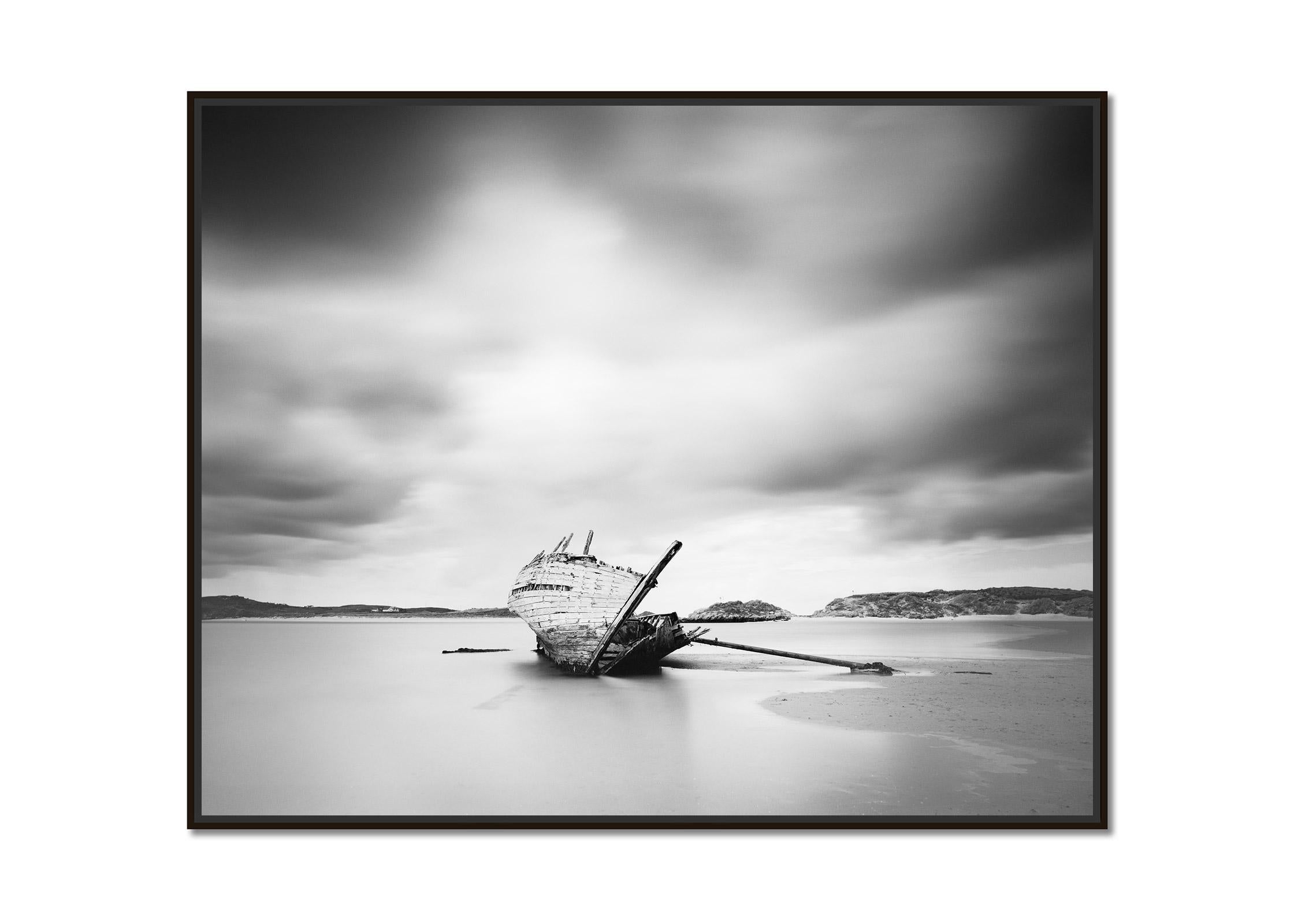 Bad Eddies, Sunken Boat, Beach, Ireland, black and white landscape photography - Photograph by Gerald Berghammer
