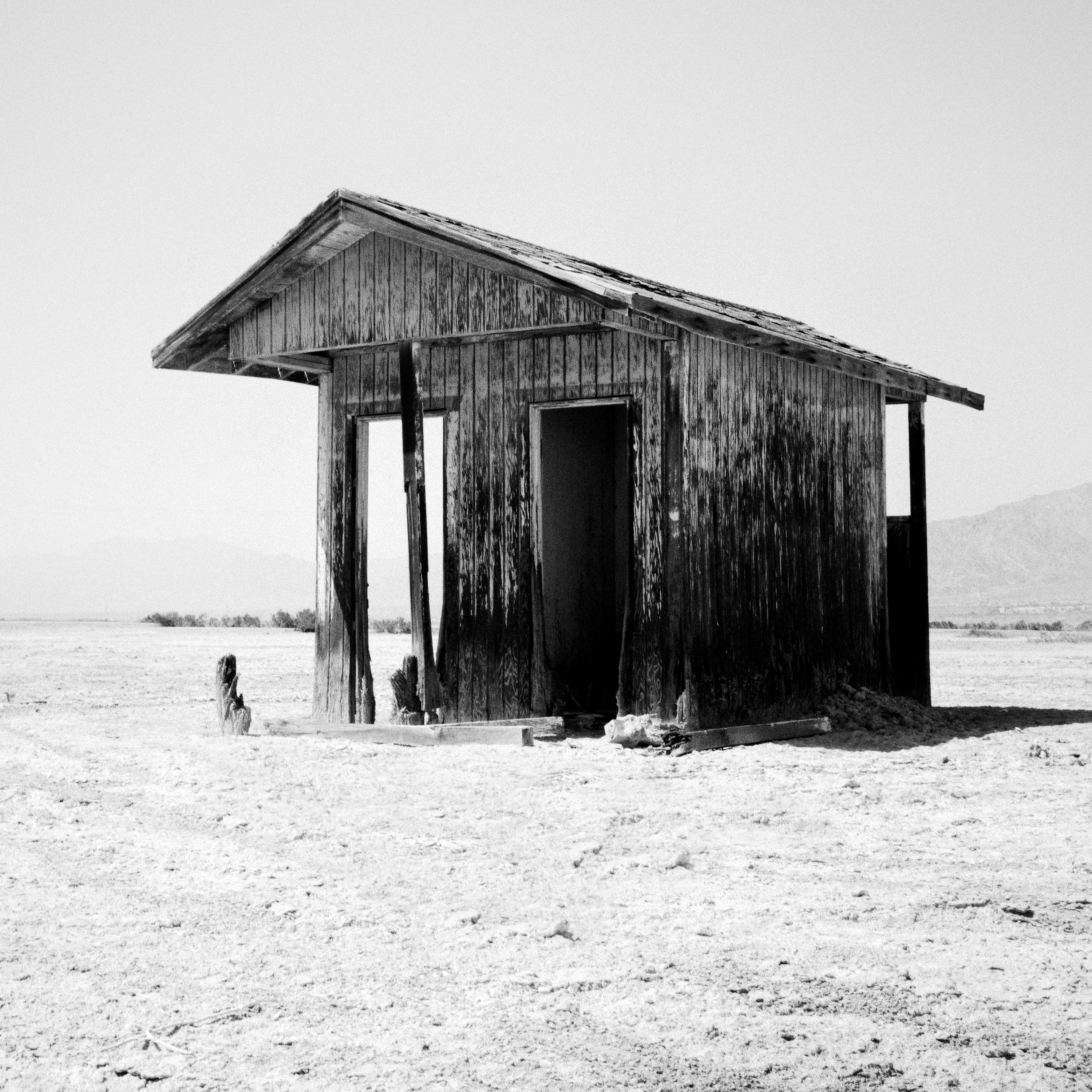 Black and White Fine Art Landscape Photography. Abandoned bath house in the desert landscape of the Salton sea, California, USA. Archival pigment ink print, edition of 9. Signed, titled, dated and numbered by artist. Certificate of authenticity