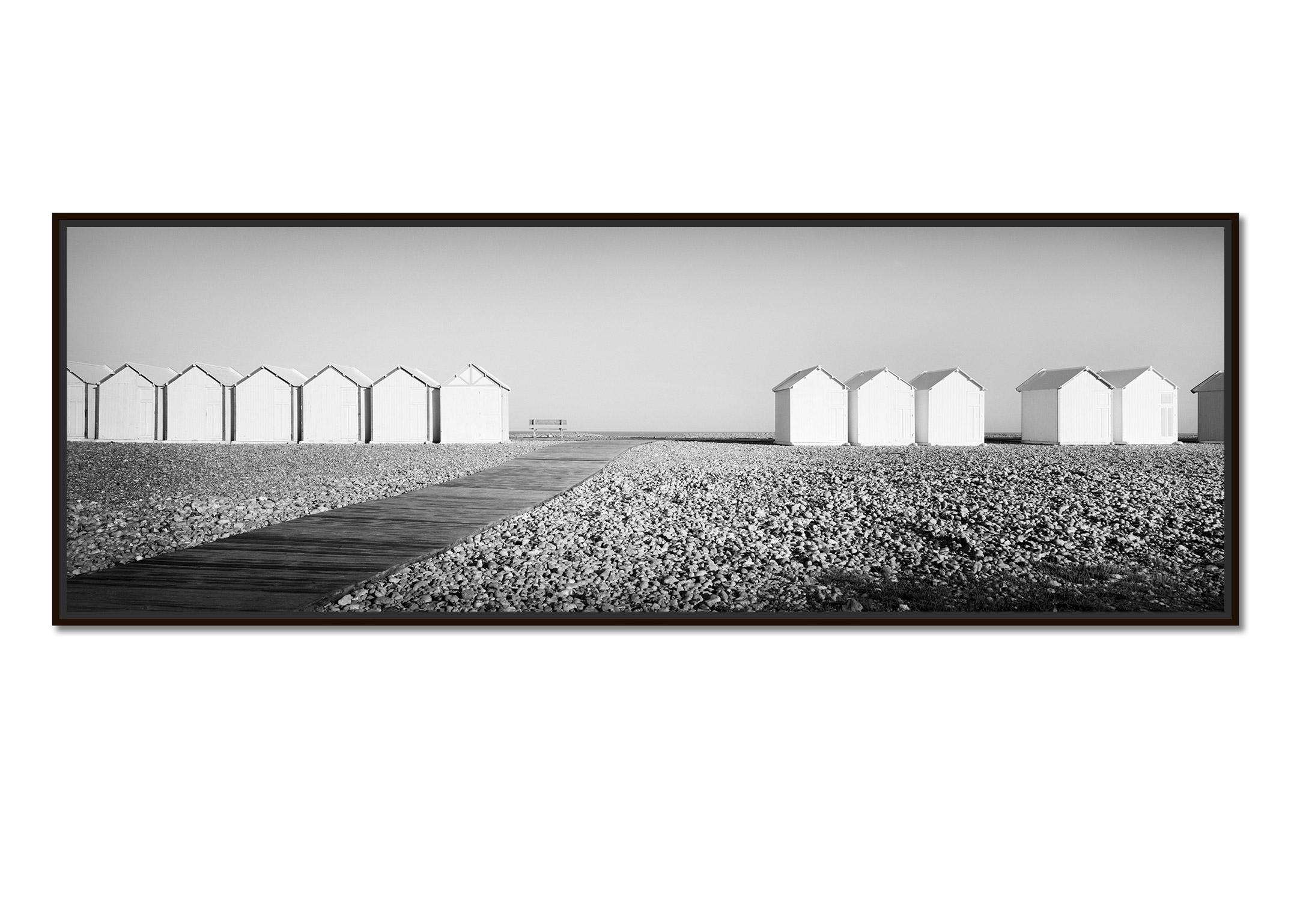 Beach Huts Panorama, bench, stones, France, black & white landscape photography - Photograph by Gerald Berghammer