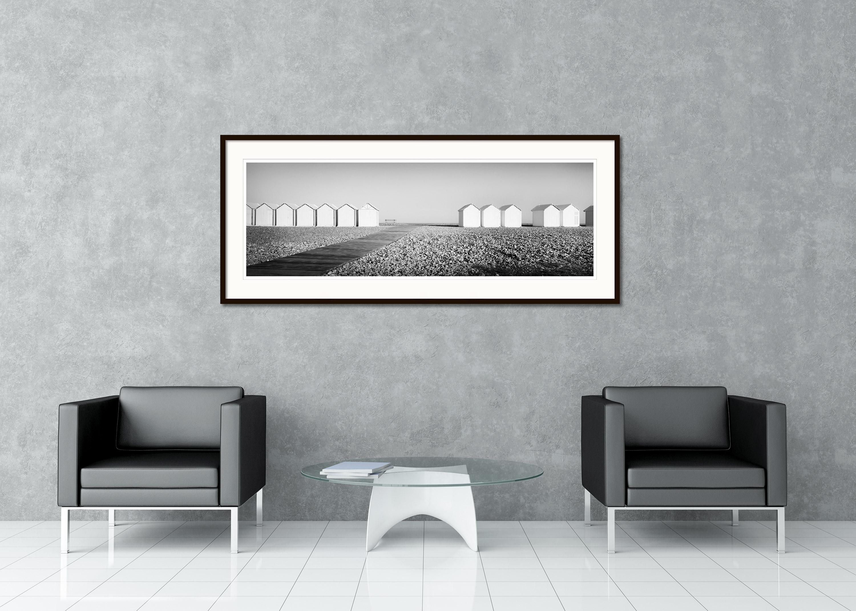 Black and White Fine Art Panorama photography - Beach huts on the beach with black stones, France. Archival pigment ink print, edition of 7. Signed, titled, dated and numbered by artist. Certificate of authenticity included. Printed with 4cm white