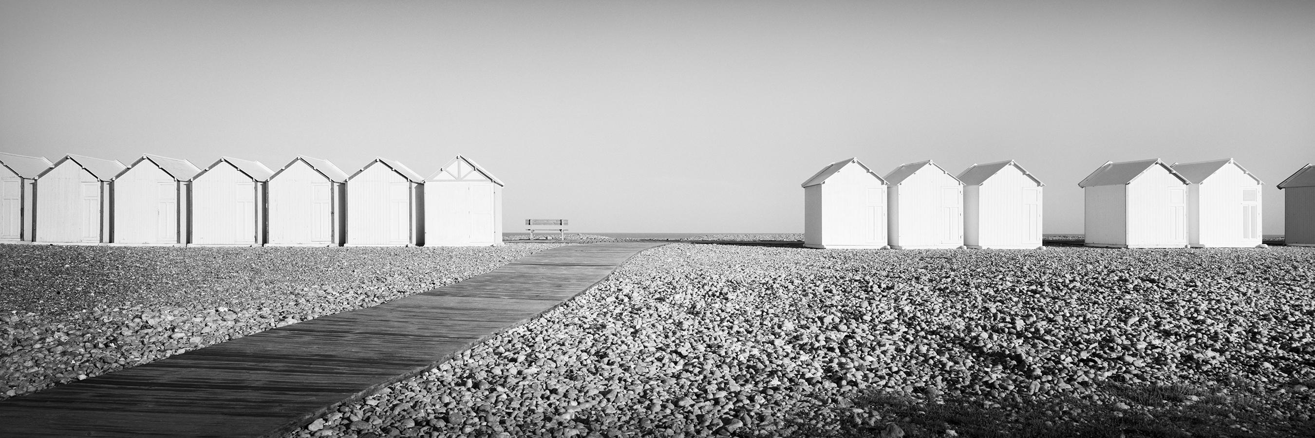 Gerald Berghammer Landscape Photograph - Beach Huts Panorama, bench, stones, France, black & white landscape photography