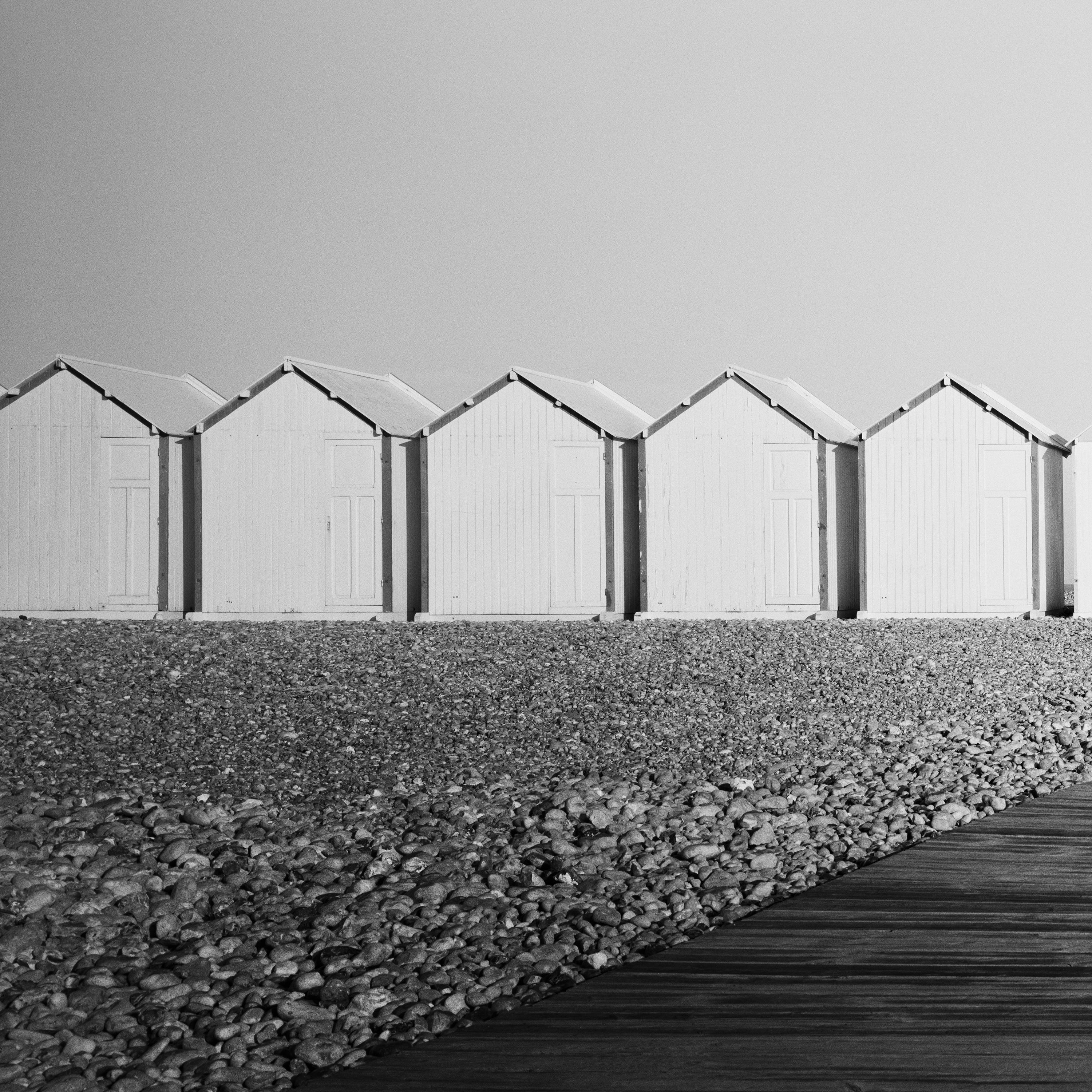 Beach Huts Panorama, rocky beach, black and white fine art photography print For Sale 3