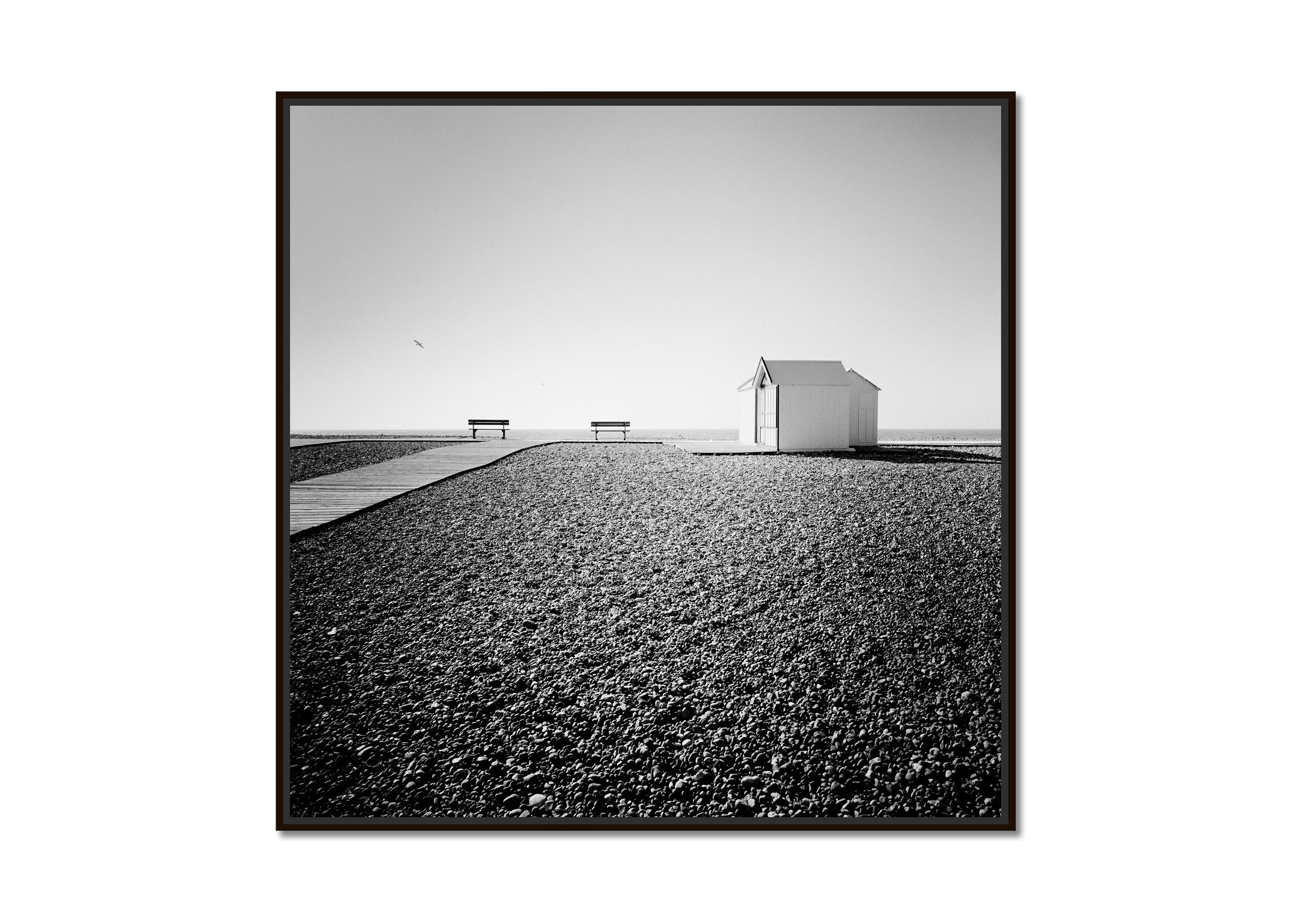 Beach Huts, Rocky Beach, Bench, France, black and white photography, landscape - Photograph by Gerald Berghammer