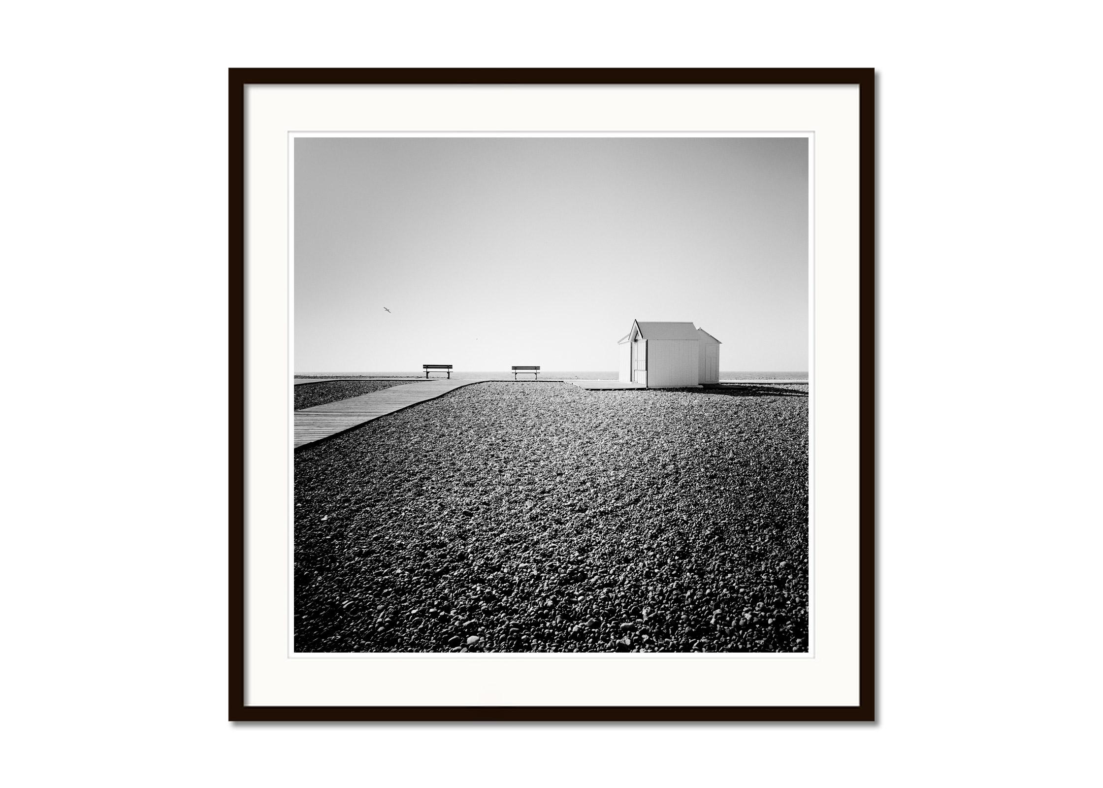 Beach Huts, Rocky Beach, Bench, France, black and white photography, landscape - Gray Black and White Photograph by Gerald Berghammer