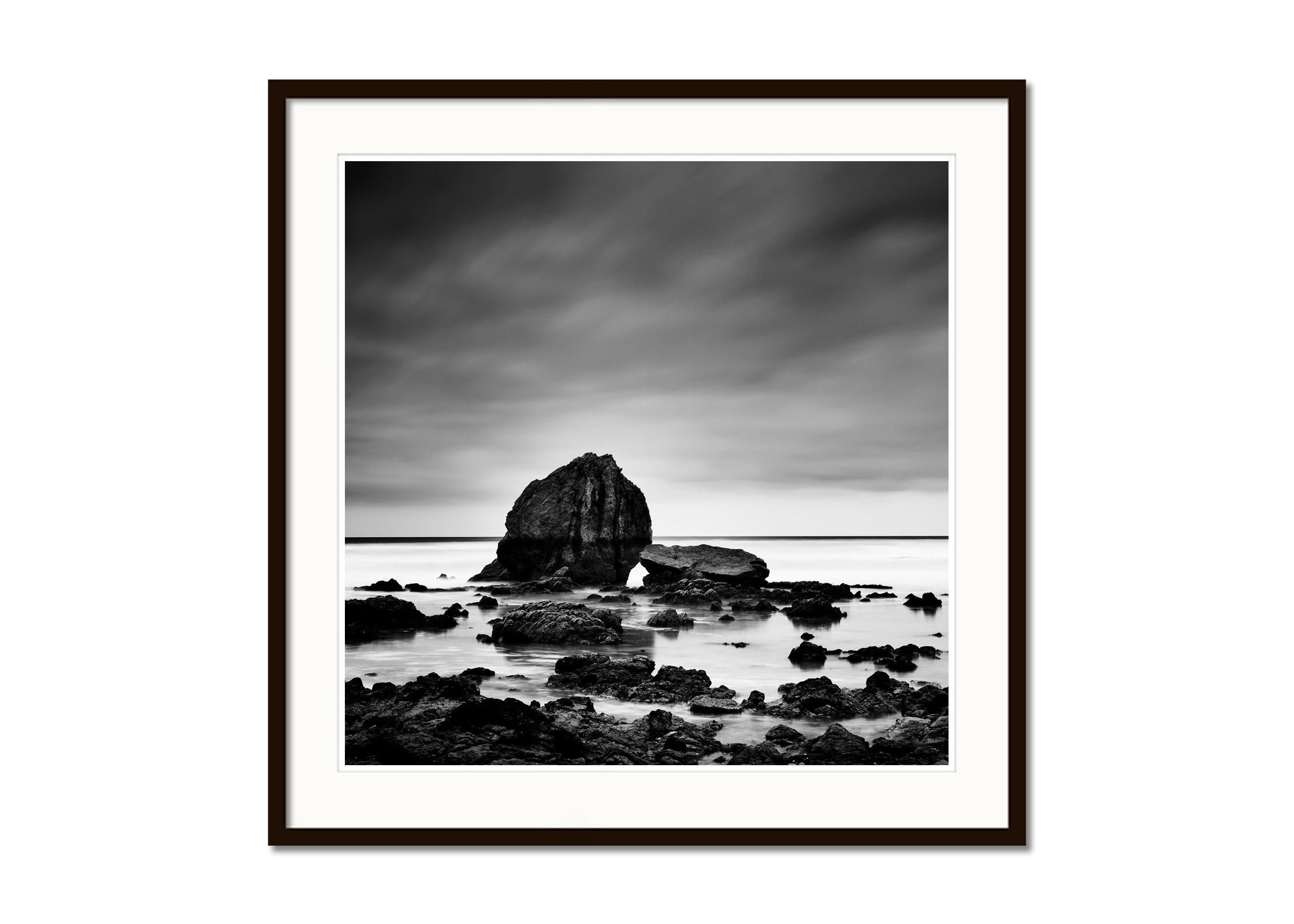 Black and white fine art long exposure waterscape - landscape photography. Rocks on the shore of the beautiful sandy beach on the French Atlantic coast. Archival pigment ink print as part of a limited edition of 8. All Gerald Berghammer prints are