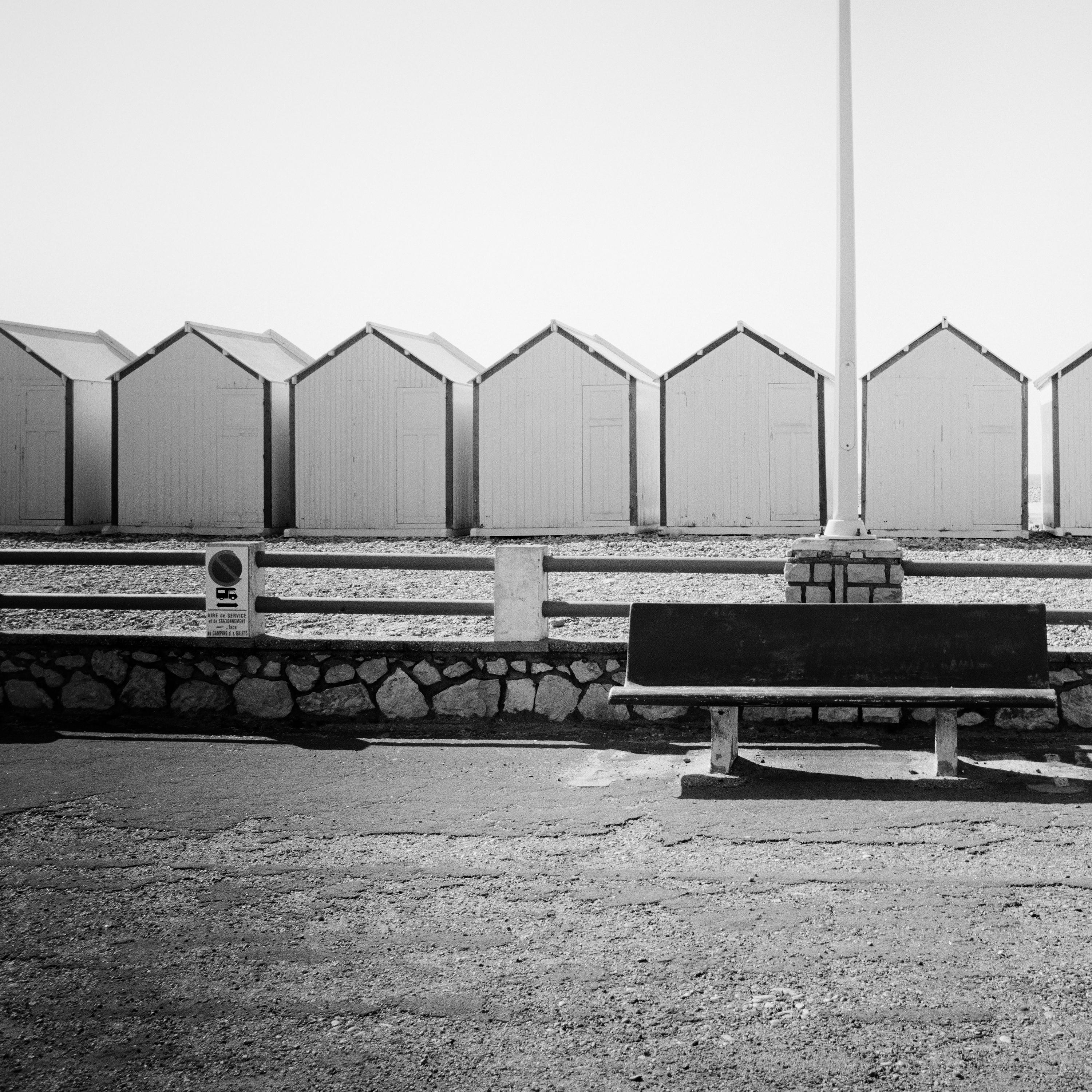 Bench on the Promenade beach huts France black white landscape art photography For Sale 3