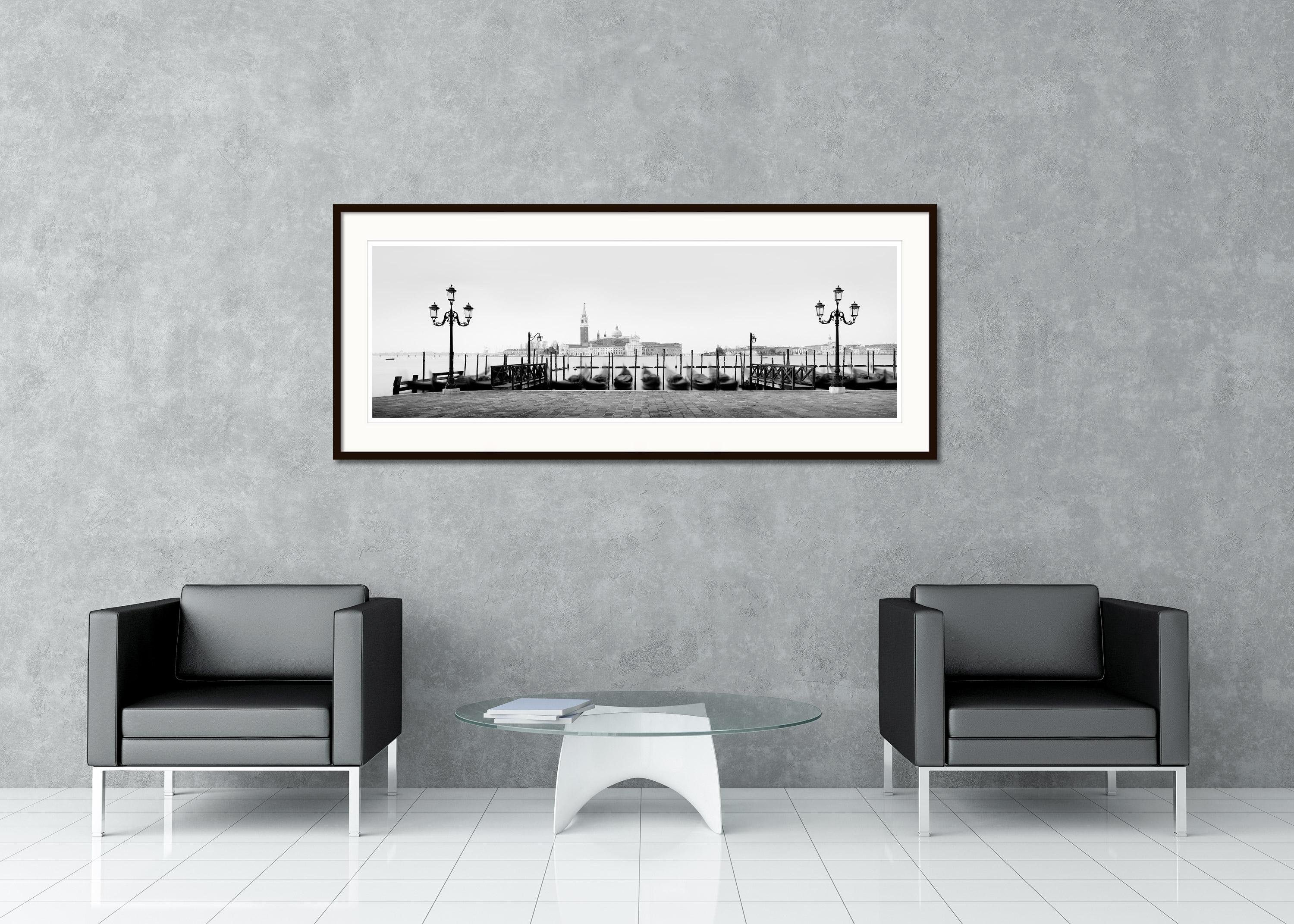 Black and white fine art panorama landscape - cityscape photography. Gondola in front of basilica on grand canal in Venice, Italy. Archival pigment ink print, edition of 7. Signed, titled, dated and numbered by artist. Certificate of authenticity