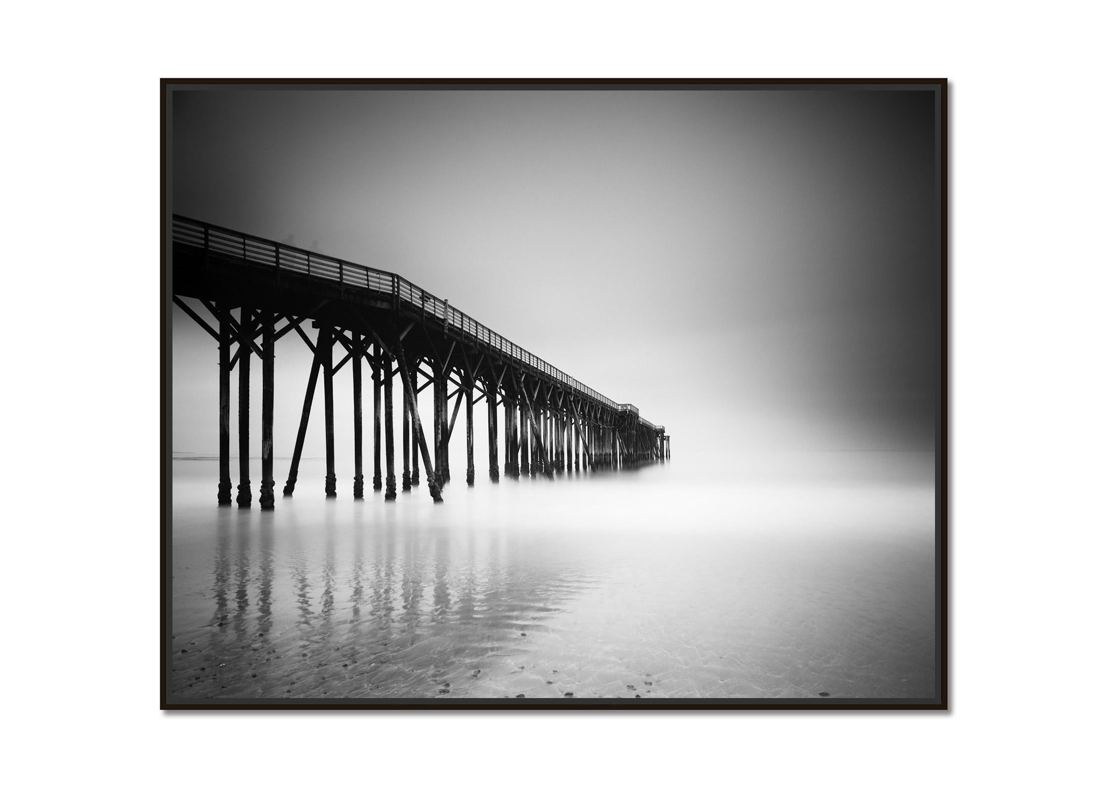 Black Pier, Beach, California, USA, black and white long exposure photography - Photograph by Gerald Berghammer