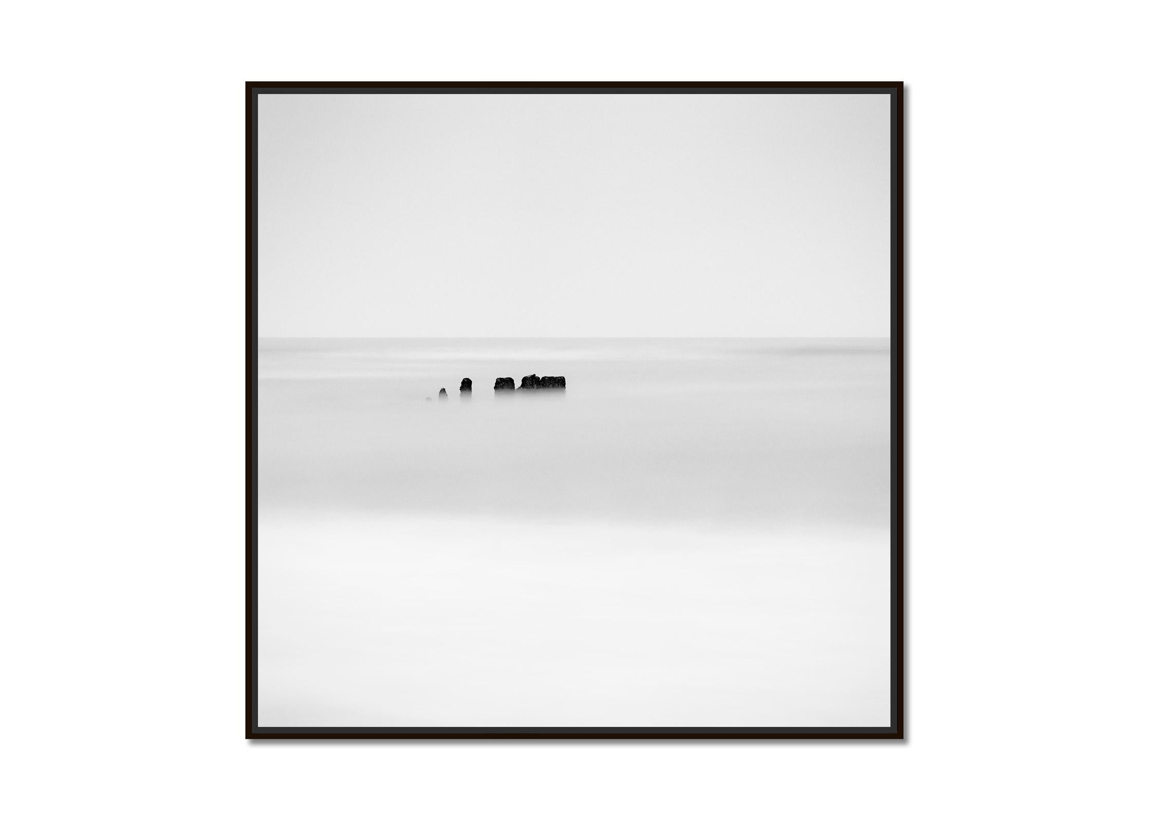 Black Leftovers, Wavebreaker, Sylt, Germany, black white photography, landscape - Photograph by Gerald Berghammer