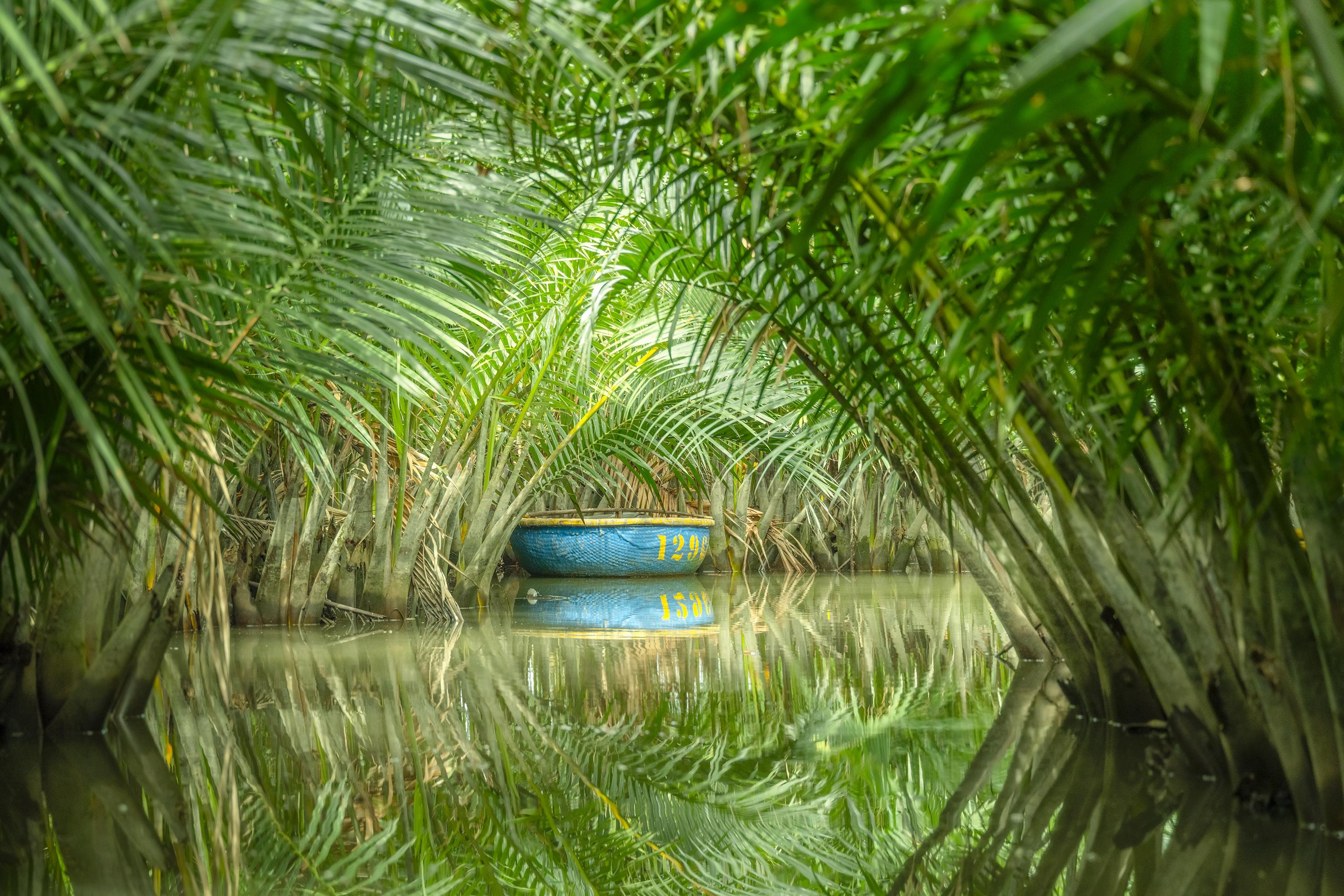 Blue Coconut Boat, Vietnam – Limited Edition Colour Waterscape Photograph Print