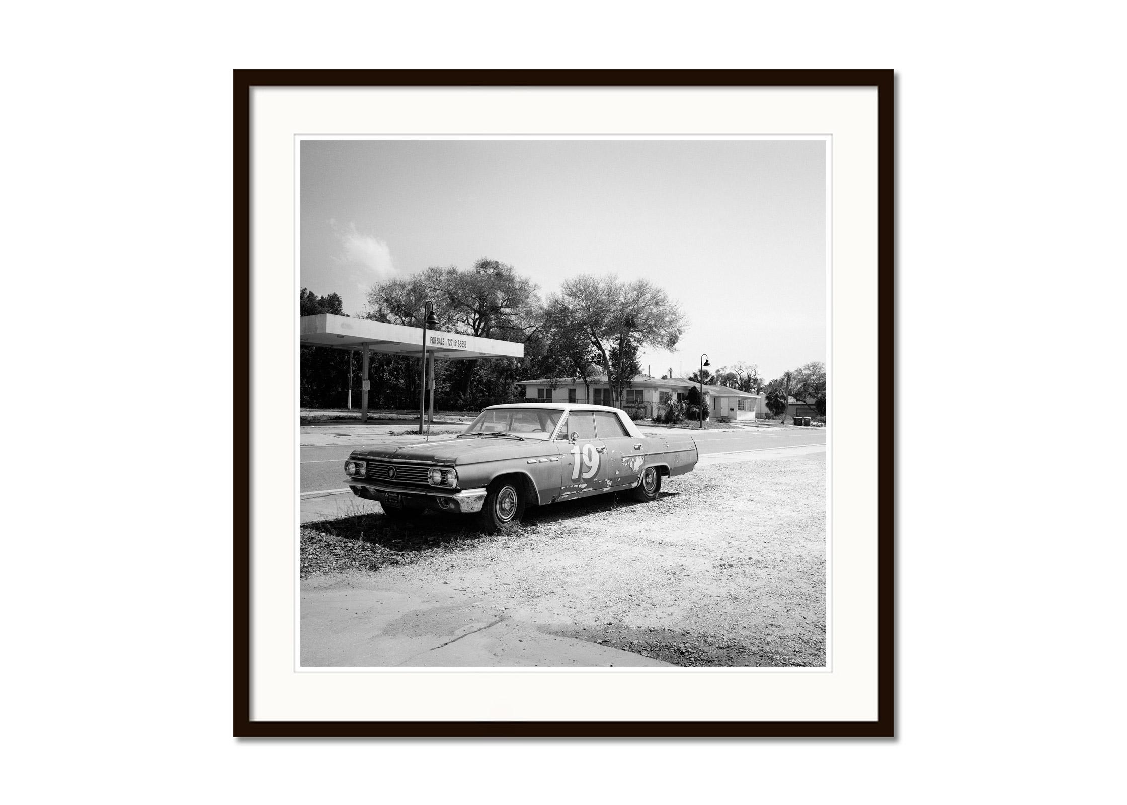 Buick for sale, classic car, Florida, USA, black and white landscape photography - Gray Landscape Photograph by Gerald Berghammer
