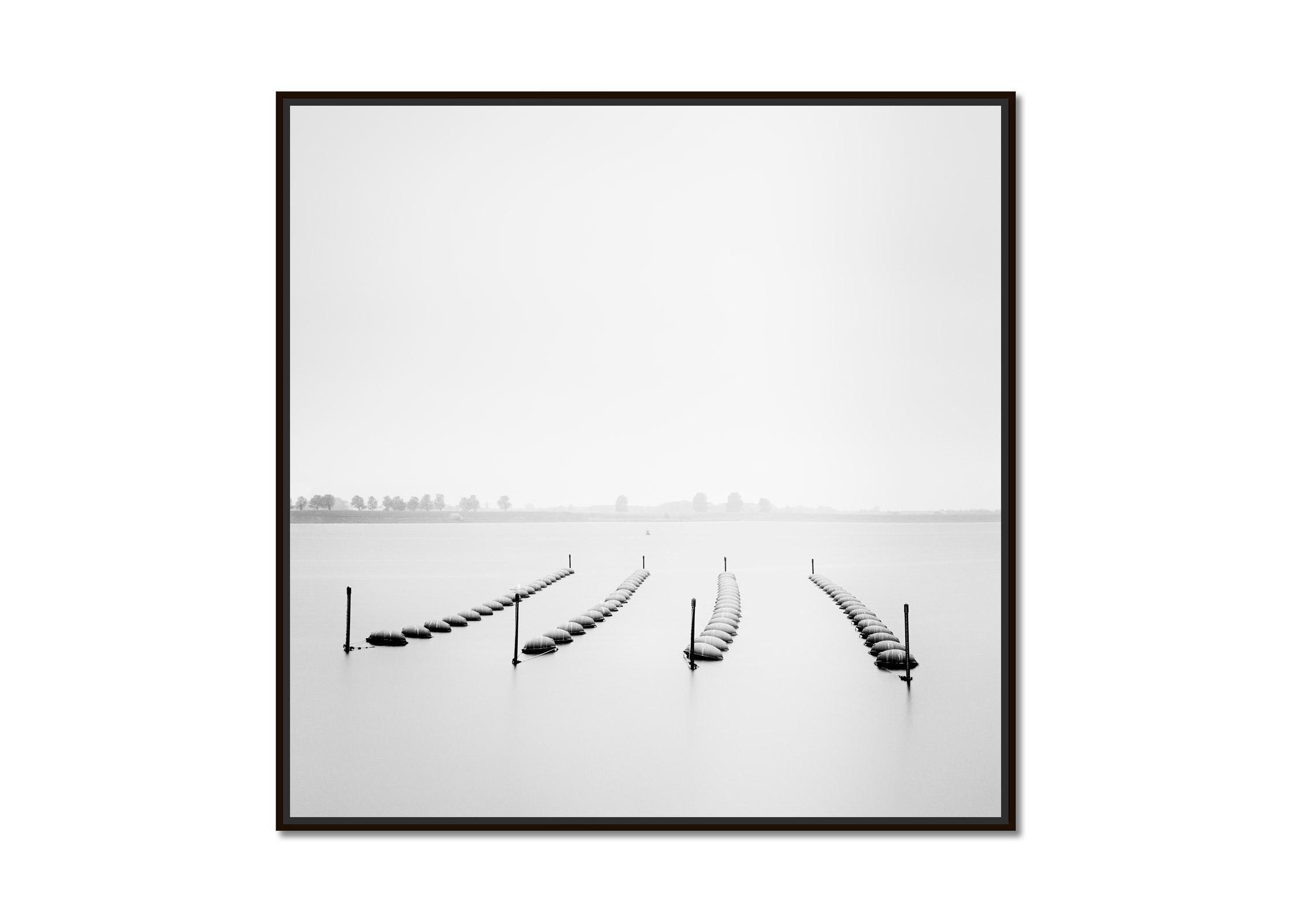 Buoys and Gulls, minimalist, black and white, waterscape, fine art photography - Photograph by Gerald Berghammer