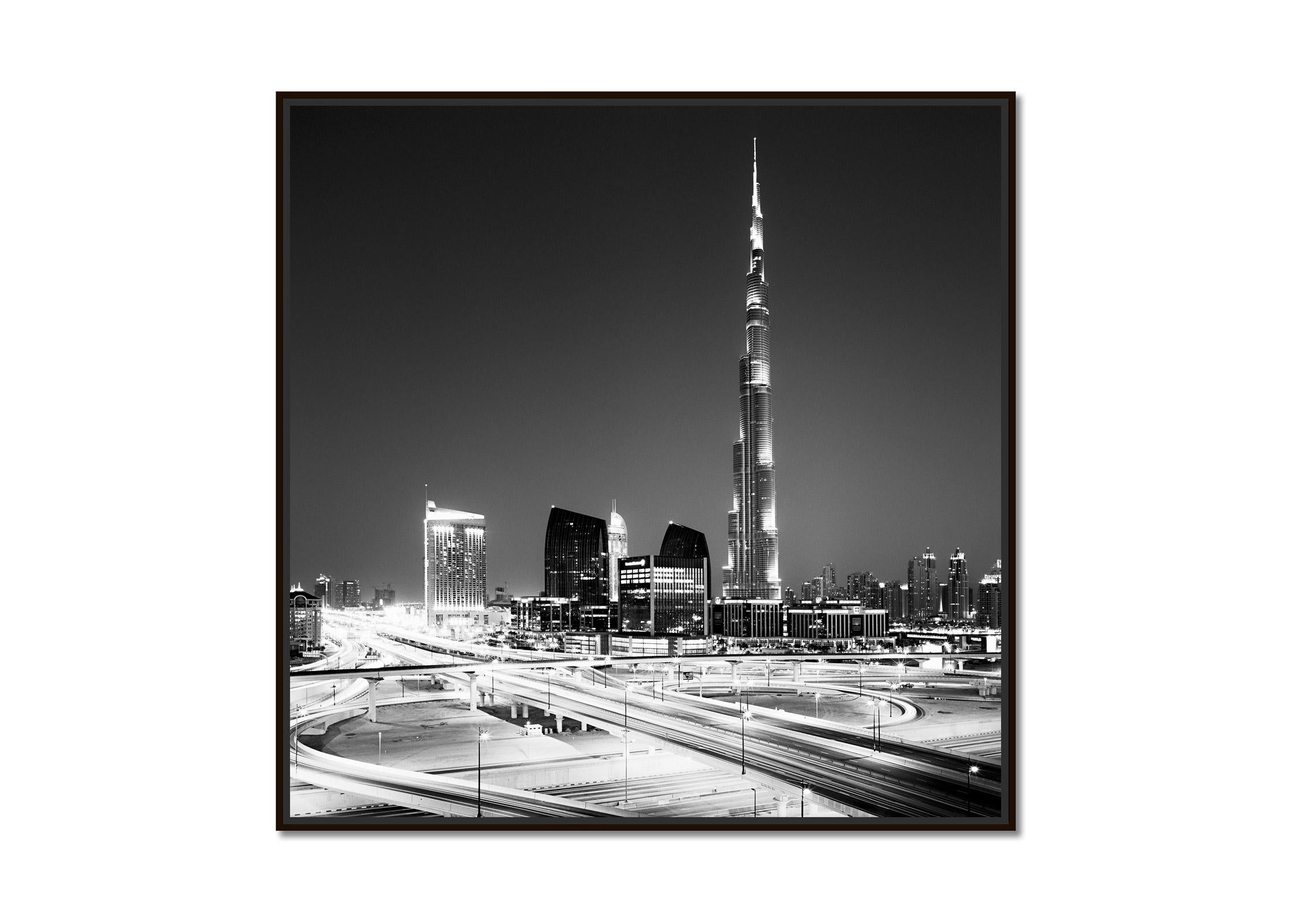 Burj Khalifa, Night, Skyscraper, Dubai, black and white photography, cityscape - Photograph by Gerald Berghammer
