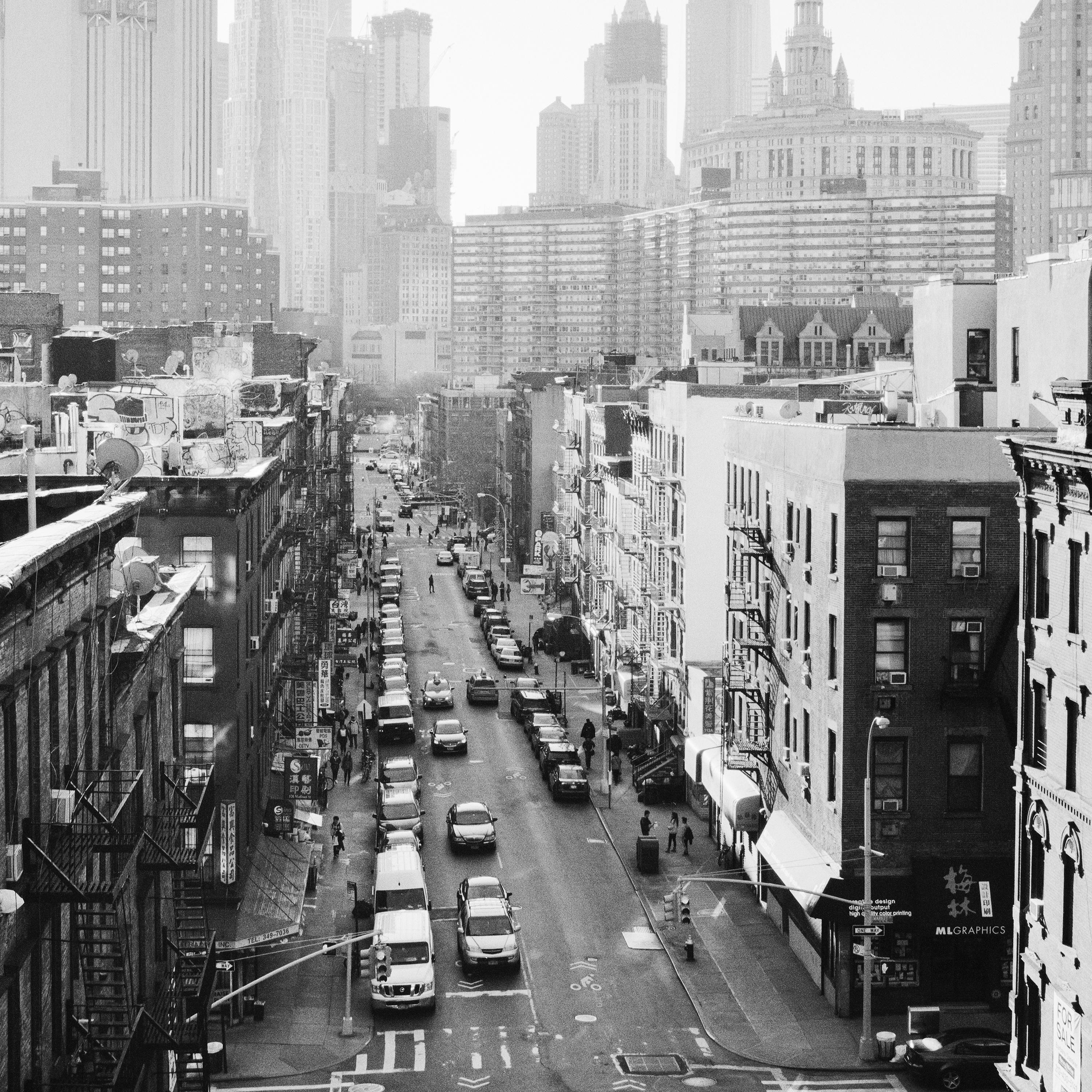 Black and white fine art cityscape - landscape photography. View of chinatown from manhattan bridge, New York City, USA.  Archival pigment ink print as part of a limited edition of 9. All Gerald Berghammer prints are made to order in limited