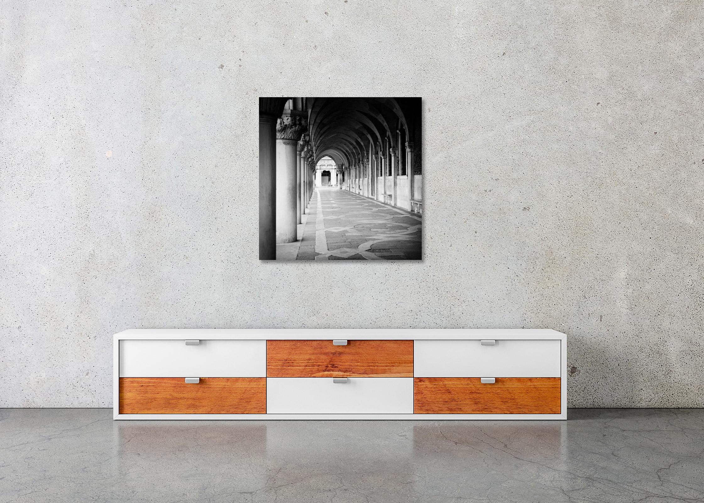 Doges Palace Arcade, Venice, Italy, black and white photography, art cityscape - Gray Landscape Photograph by Gerald Berghammer