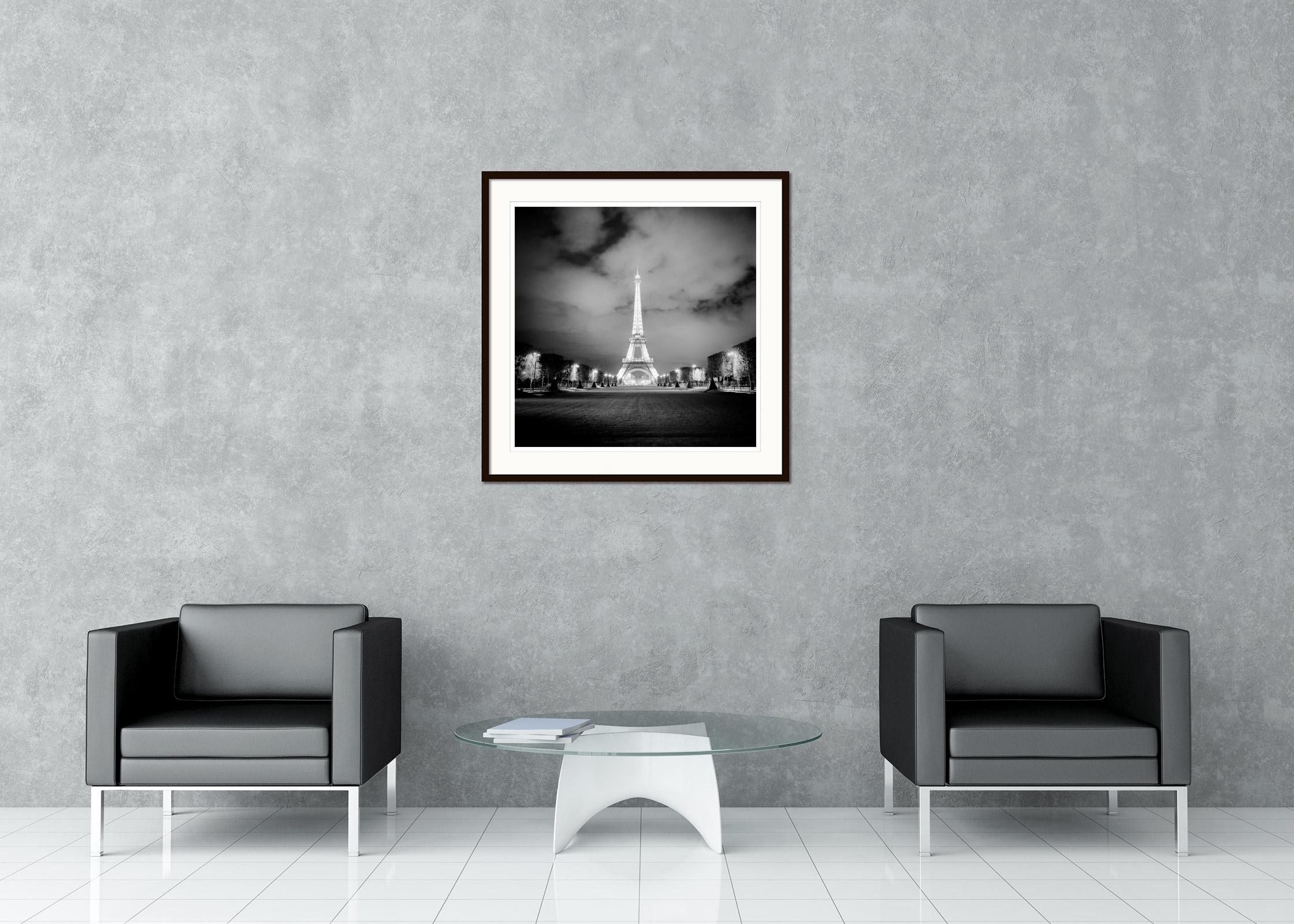 Black and white fine art cityscape - landscape night photography. Eiffel tower at night with light show, Paris, France. Archival pigment ink print, edition of 9. Signed, titled, dated and numbered by artist. Certificate of authenticity included.