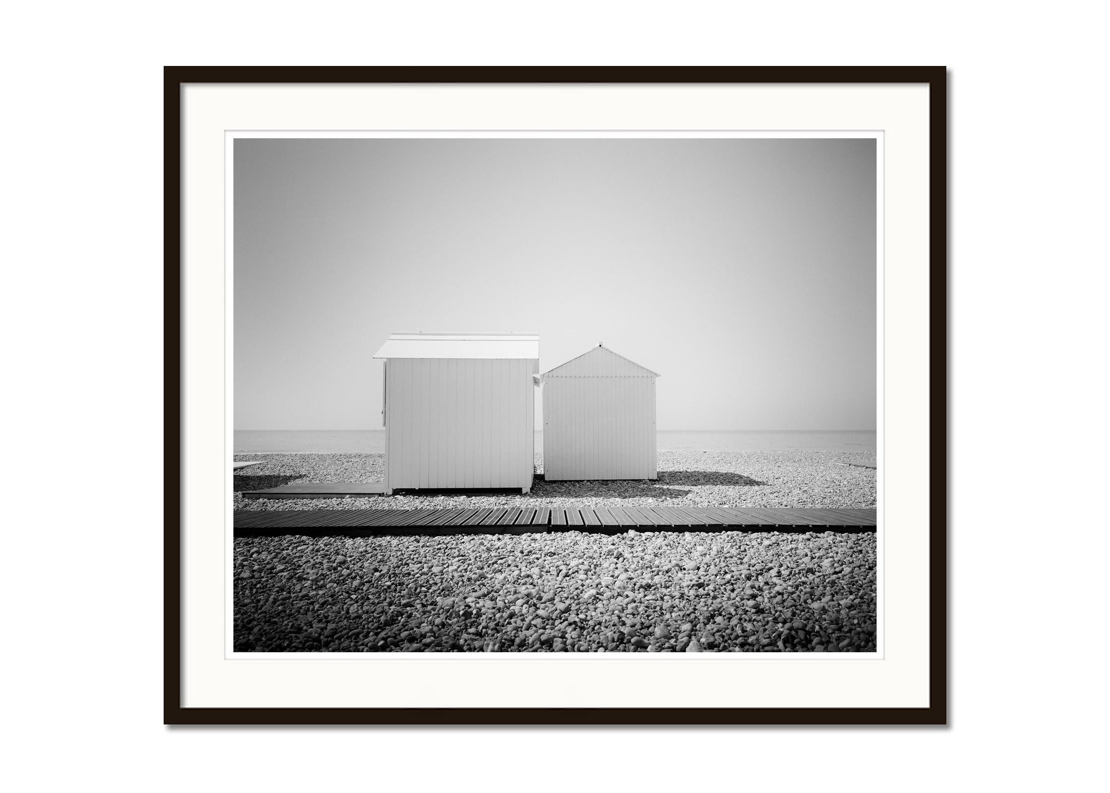 Esplanade, Beach Huts, Normandie, France, black and white landscape photography - Gray Black and White Photograph by Gerald Berghammer