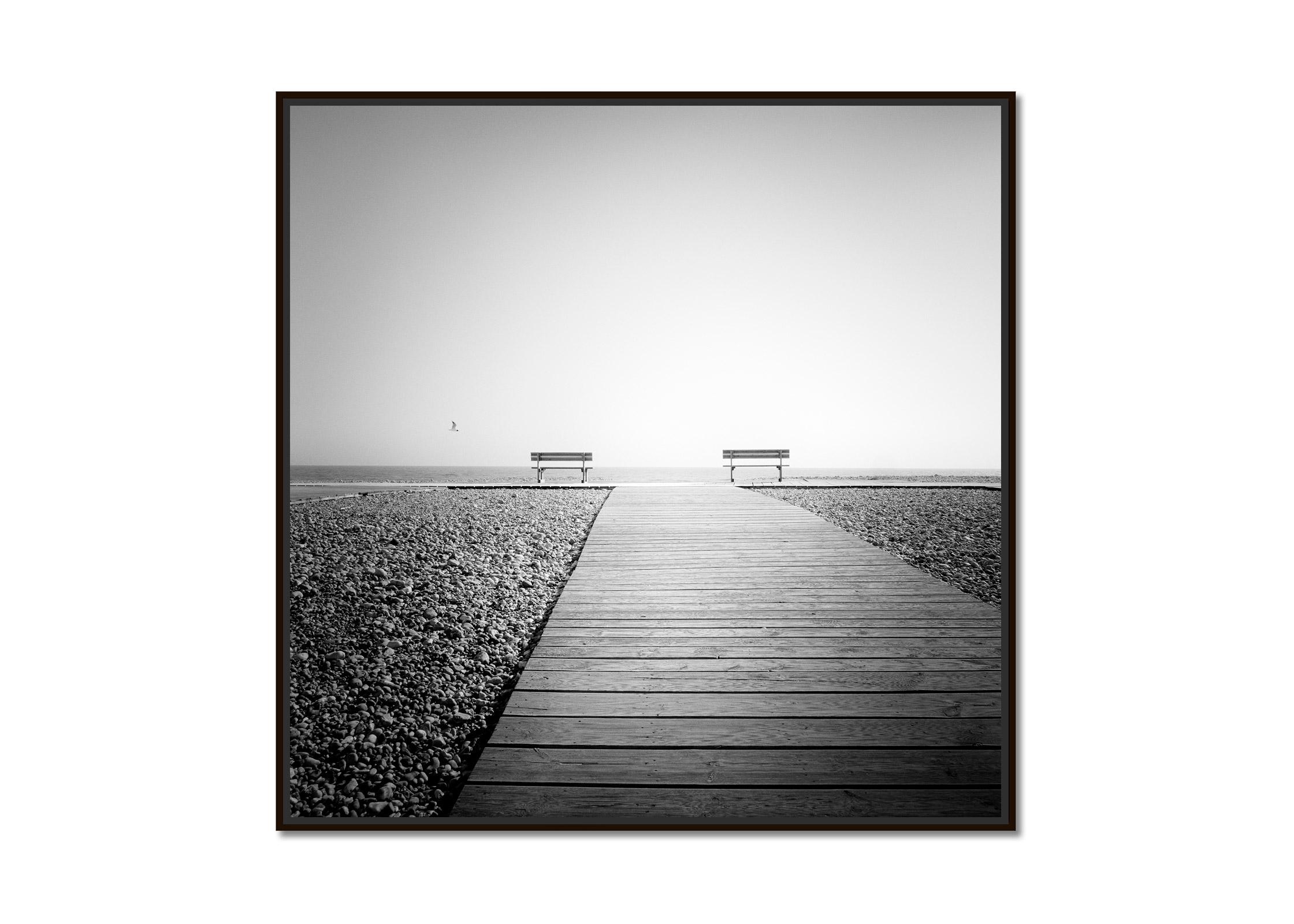 Esplanade, lonely rocky beach, France, Black and White landscape art photography - Photograph by Gerald Berghammer