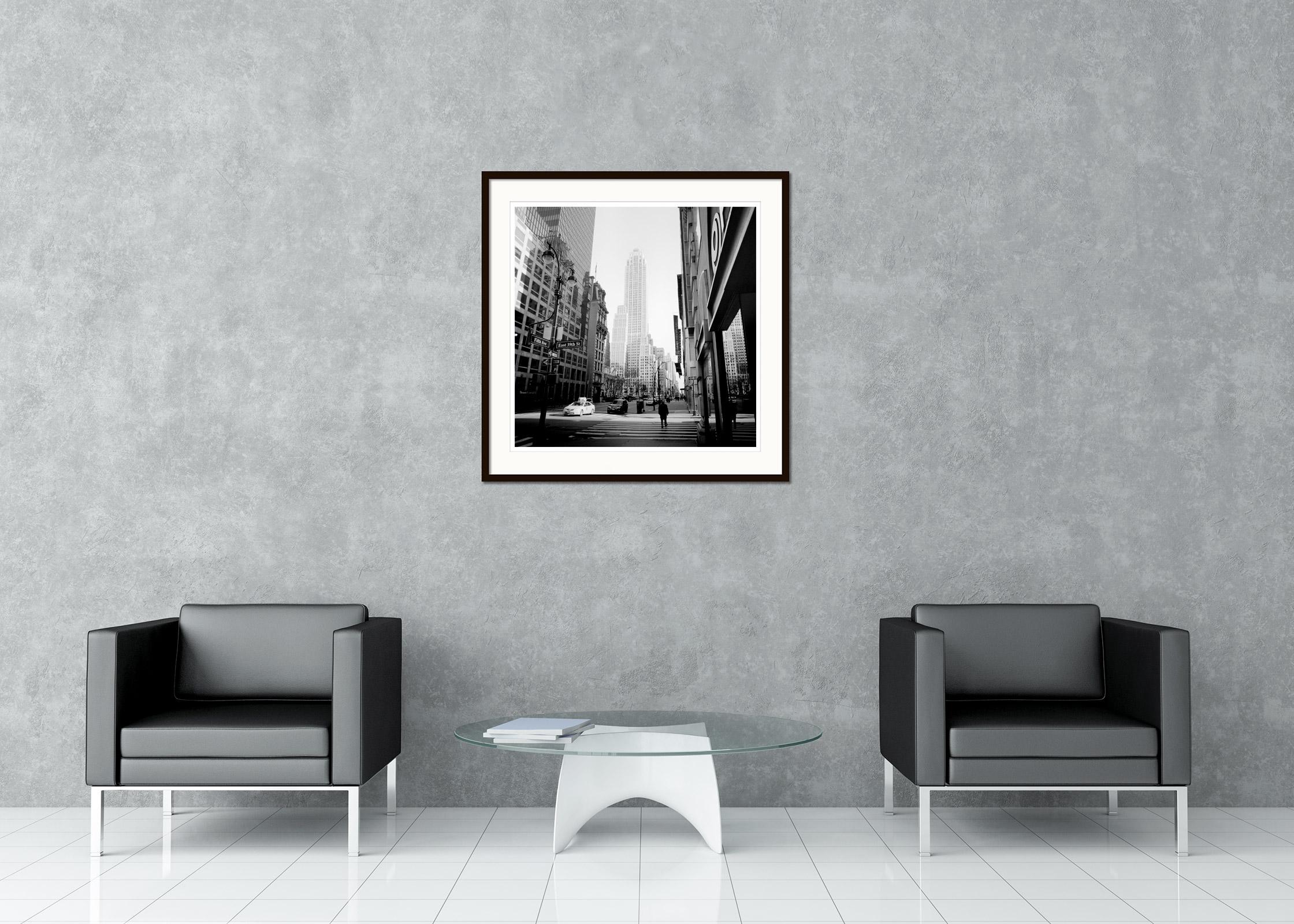 Black and white fine art cityscape photography. Fifth Ave, East 39th St, New York City with a view of the Empire State Building. Archival pigment ink print, edition of 9. Signed, titled, dated and numbered by artist. Certificate of authenticity