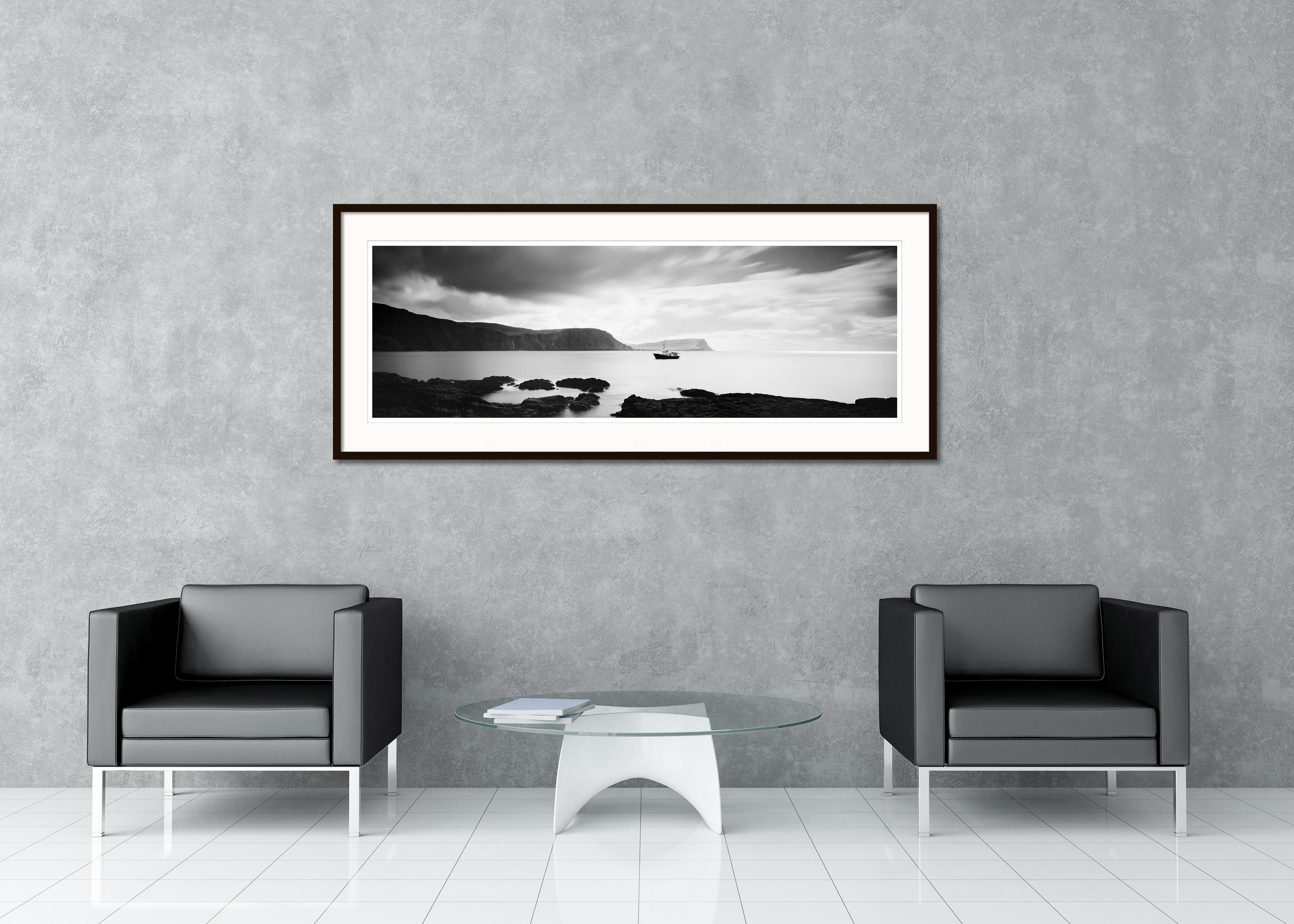 Black and White Fine Art Panorama Photography - Fishing boat at Neist Point in Scotland with fantastic coastline in stormy weather. Archival pigment ink print, edition of 9. Signed, titled, dated and numbered by artist. Certificate of authenticity