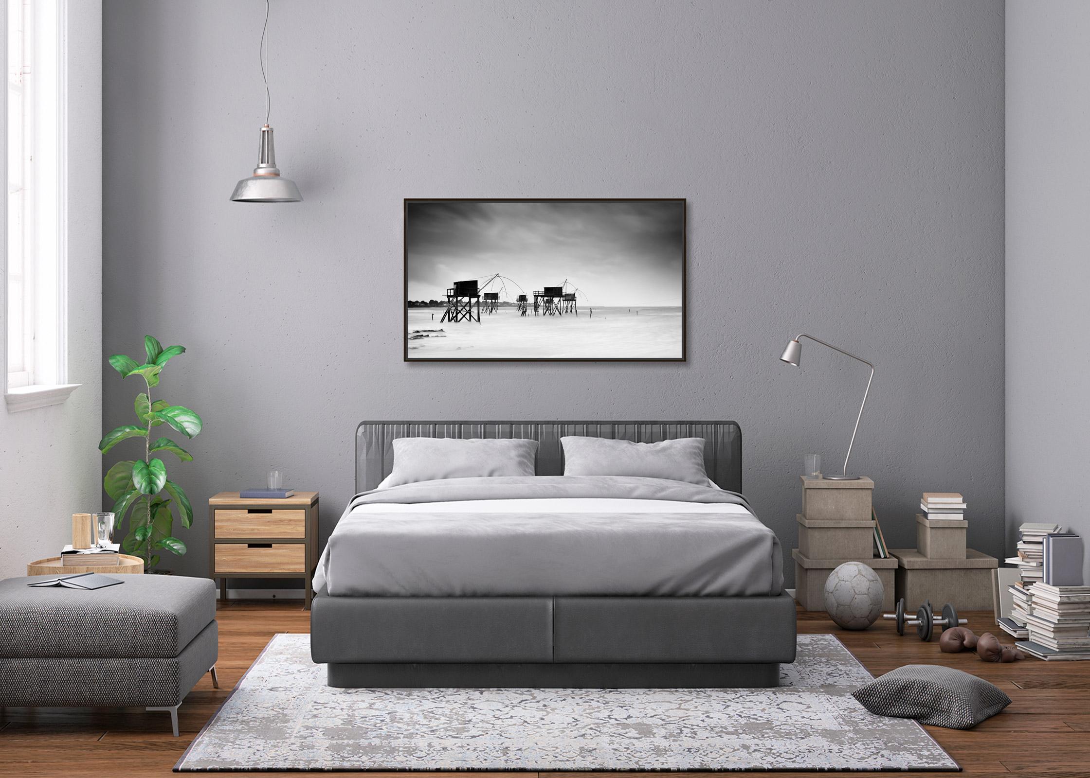 Black and white fine art panorama long exposure waterscape - landscape photography print. Fisherman's huts in the surf on the beach in France. Archival pigment ink print, edition of 7. Signed, titled, dated and numbered by artist. Certificate of