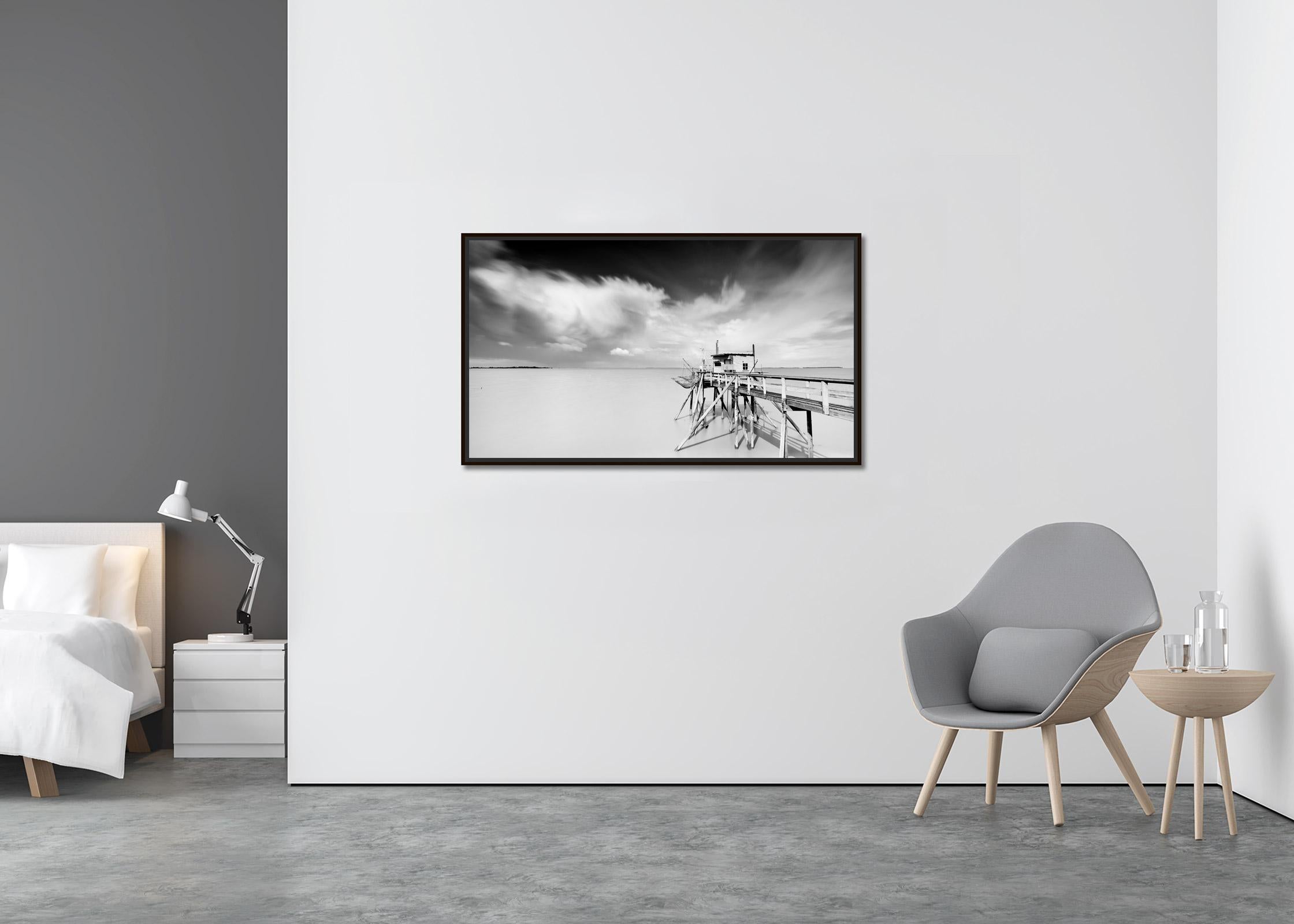 Fishing Hut on Stilts, Panorama, giant Clouds, fine art landscape photography - Contemporary Photograph by Gerald Berghammer