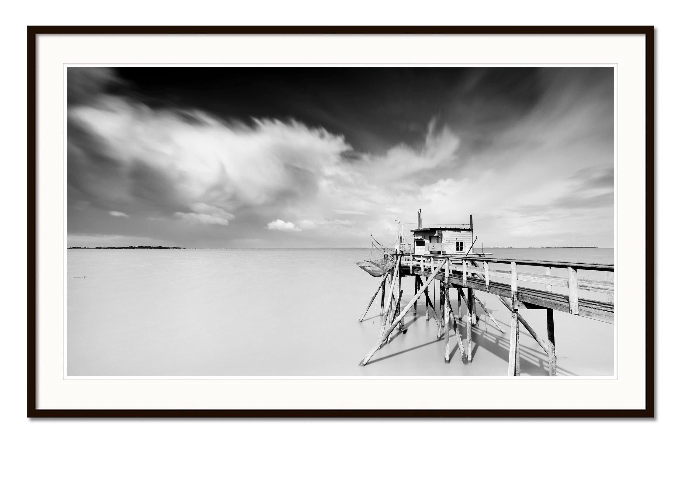 Fishing Hut on Stilts, Panorama, giant Clouds, fine art landscape photography - Gray Black and White Photograph by Gerald Berghammer