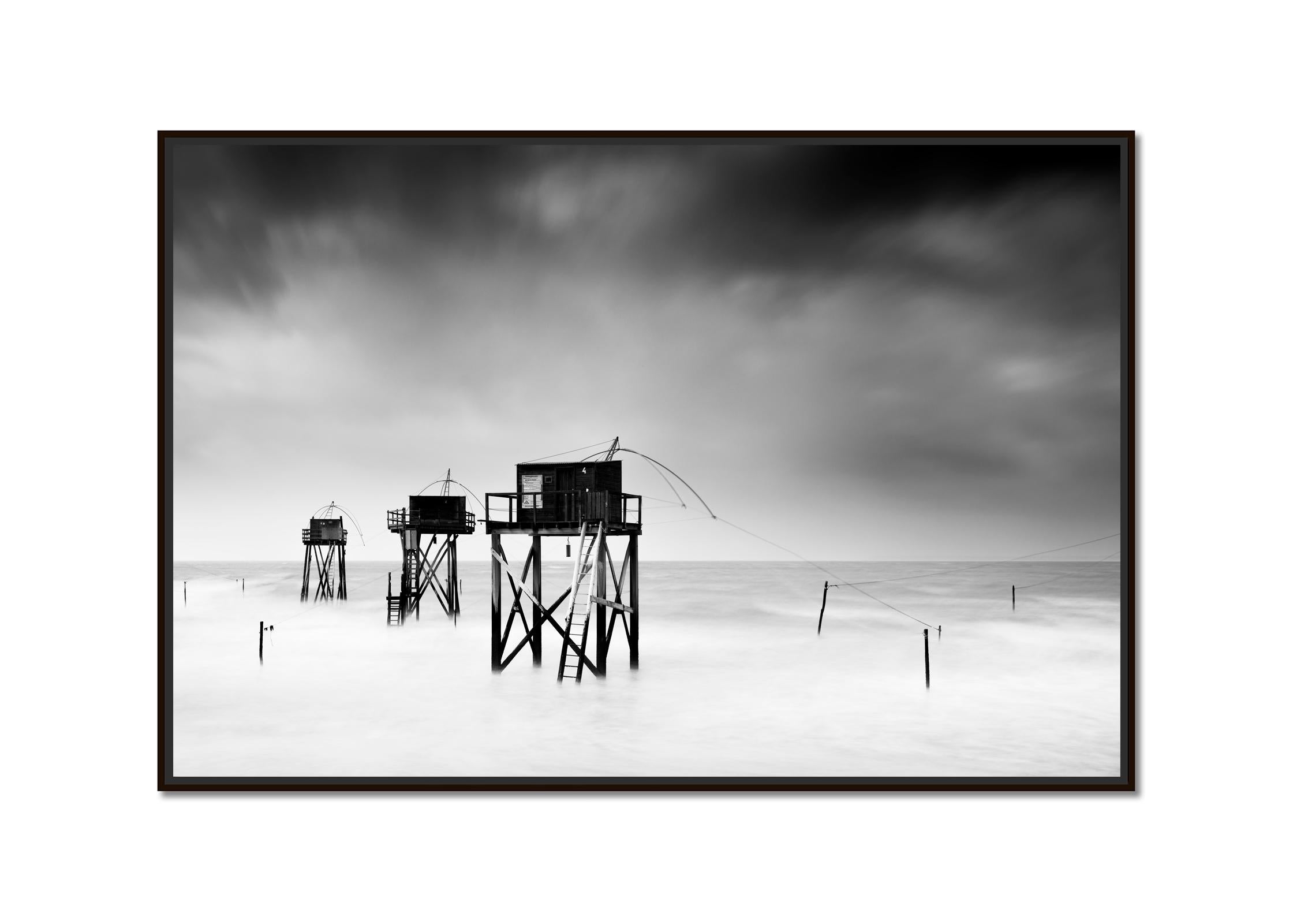 Fishing Hut On Stilts Panorama,  stormy, Atlantic Ocean, France, black and white - Photograph by Gerald Berghammer