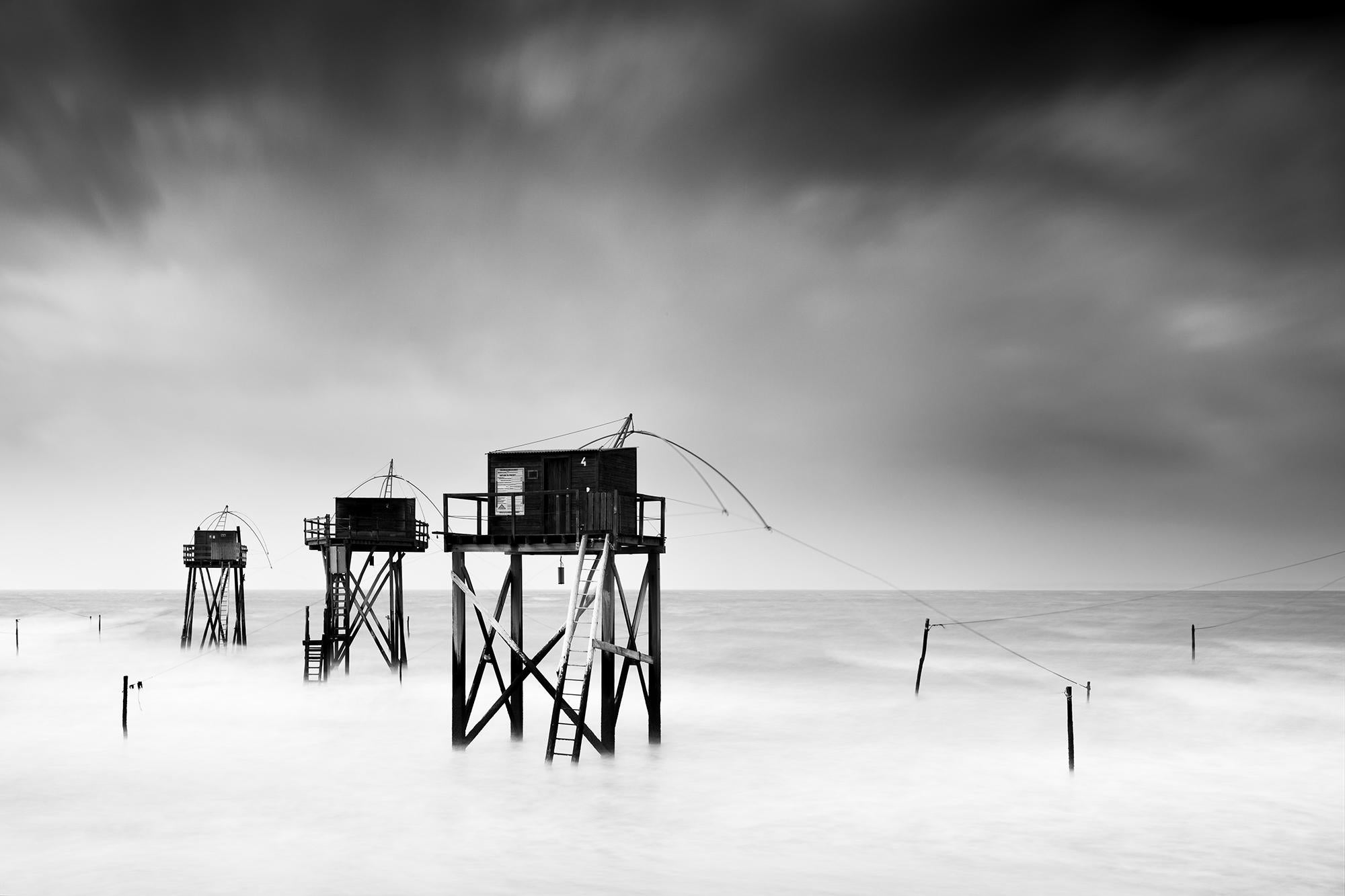 Gerald Berghammer Black and White Photograph - Fishing Hut On Stilts Panorama,  stormy, Atlantic Ocean, France, black and white
