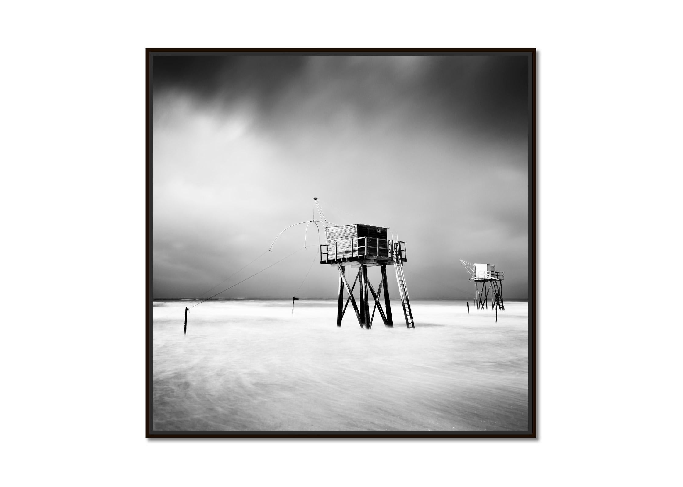 Fishing Hut, Saint Michel Chef Chef, black and white art waterscape photography - Photograph by Gerald Berghammer